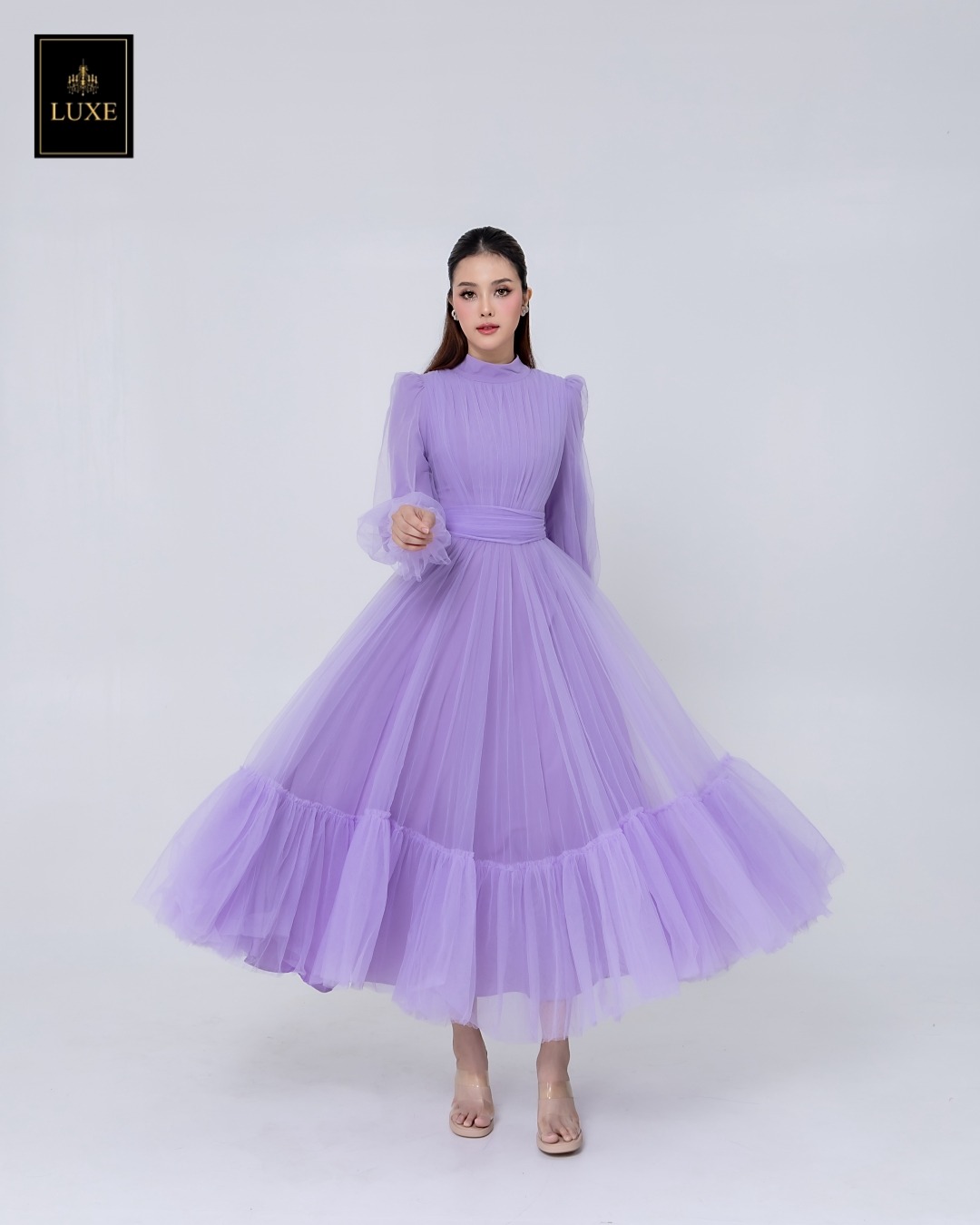 เดรสแฟชั่น แม็กซี่เดรสเสื้อคอปีนแขนยาว กระโปรงบานต่อชายรูดระบายรอบตัว มีโบว์ผูกเอว