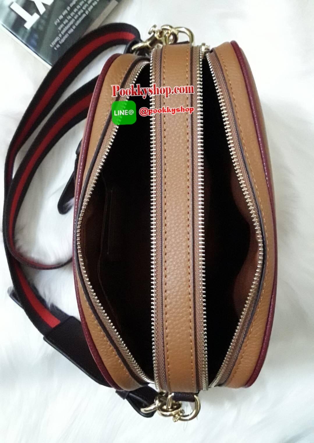 JES CROSSBODY IN COLORBLOCK (COACH F72704) LIGHT SADDLE/GOLD Refined pebble leather| Inside multifunction pocket| Double zip closure, fabric lining| Outside slip pocket| Detachable strap with 22" drop for shoulder or crossbody wear