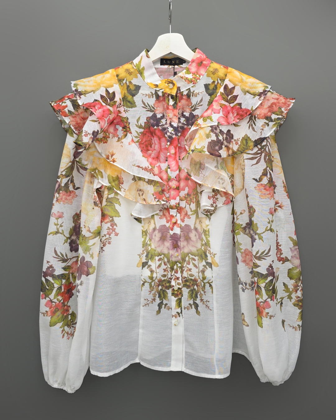 ชุดเซทแฟชั่น เซ็ตเสื้อคอกลมแขนยาว+กระโปรงยาว แต่งระบายตัวเสื้อหน้าและหลัง