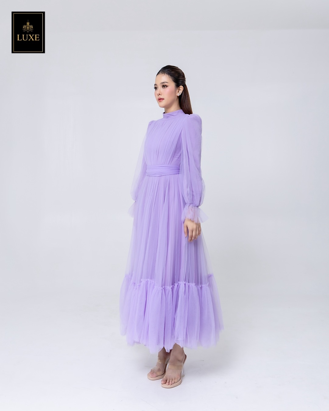 เดรสแฟชั่น แม็กซี่เดรสเสื้อคอปีนแขนยาว กระโปรงบานต่อชายรูดระบายรอบตัว มีโบว์ผูกเอว