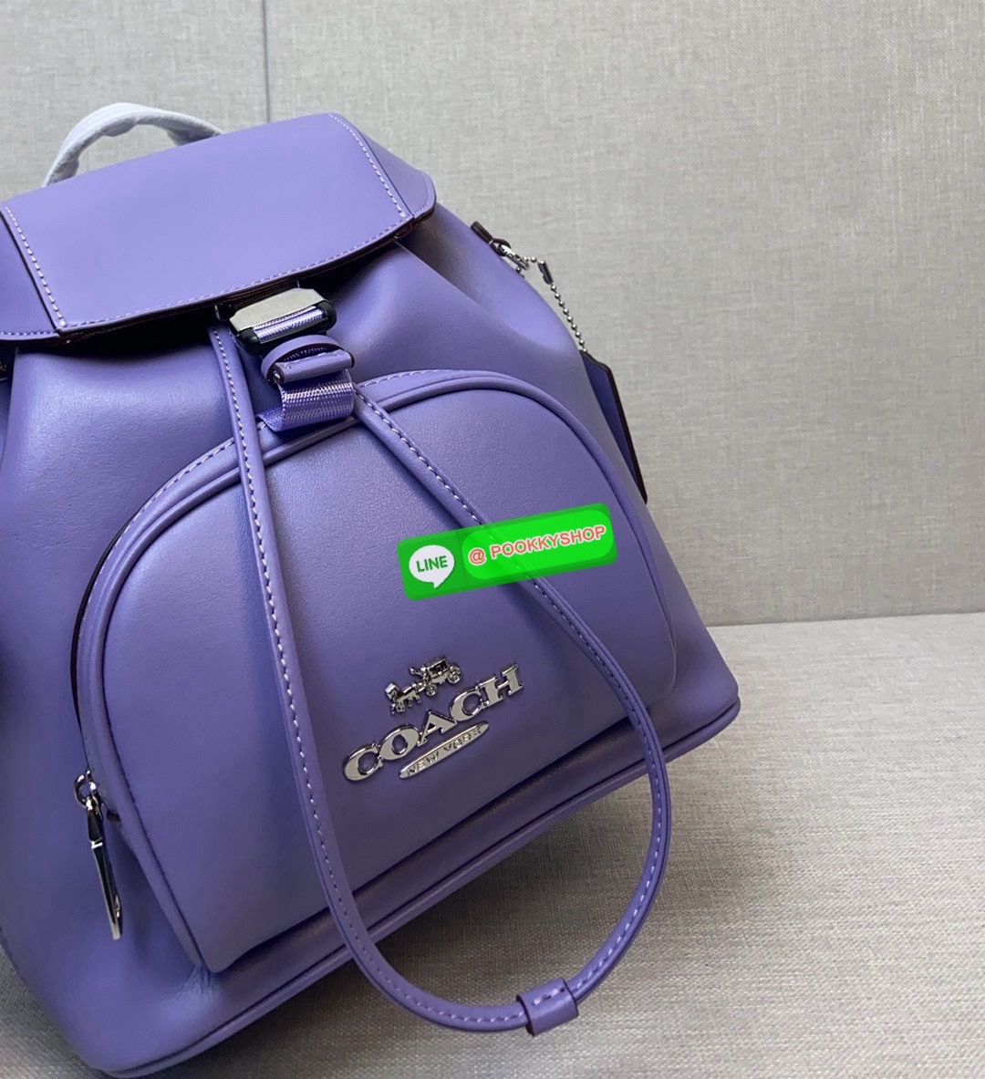 COACH PACE BACKPACK COACH CR100 | Refined calf leather | Inside zip and multifunction pockets | Drawstring and speedclip closures, fabric lining | Handle with 3" drop | Outside zip pocket | Outside zip access to interior |