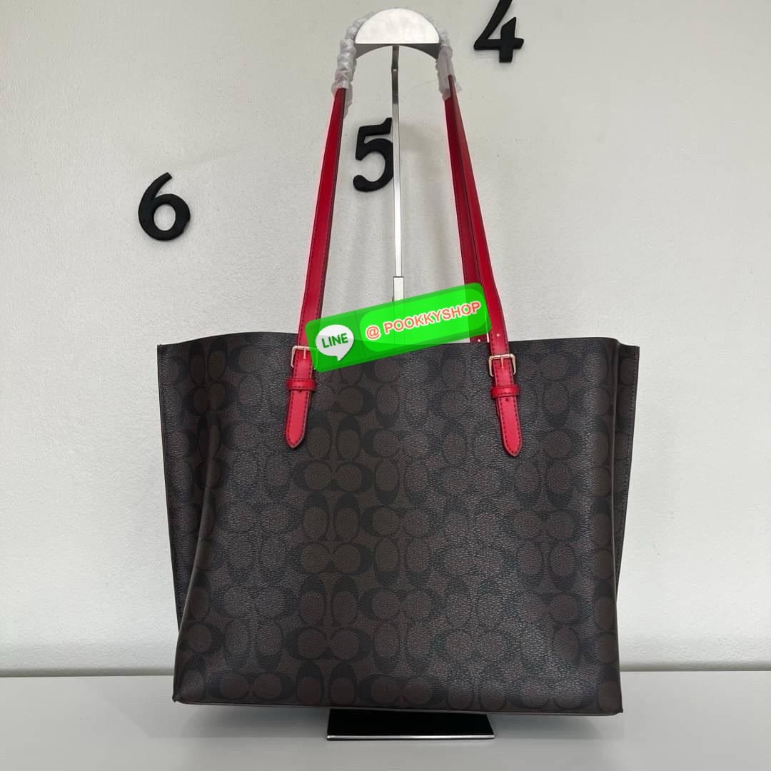 Coach MOLLIE TOTE IN SIGNATURE CANVAS (COACH 1665) กระเป๋าหนังใบเคลือบซิกเนเจอร์และหนังเรียบ ภายในกระเป๋ามัลติฟังก์ชั่น ปิดด้วยซิป ซับในผ้า หูหิ้วพร้อมหูหิ้ว 10 1/4" ช่องเปิดด้านข้าง