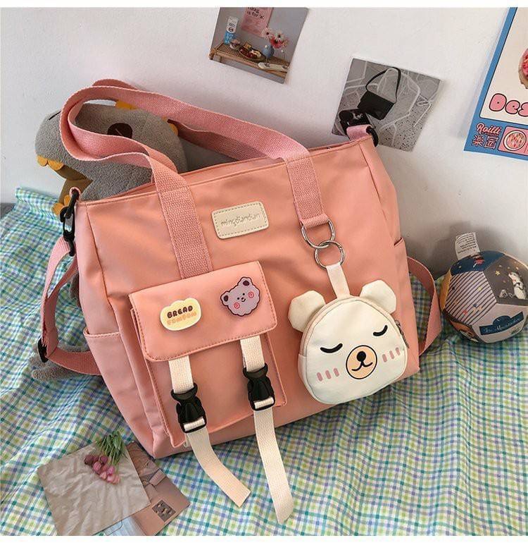 รุ่นใหม่ พร้อมส่ง!!!!!!! Miki Bear cross bag (BP) คุ้มมาก ช่องเยอะมากถึงมากที่สุด แถมฟรี! พวงกุญแจหมีเป็นซิป ใส่บัตรใส่เหรียญได้ ถอดออกแยกใช้งานได้ เนื้อผ้ากันน้ำด้วยนะ