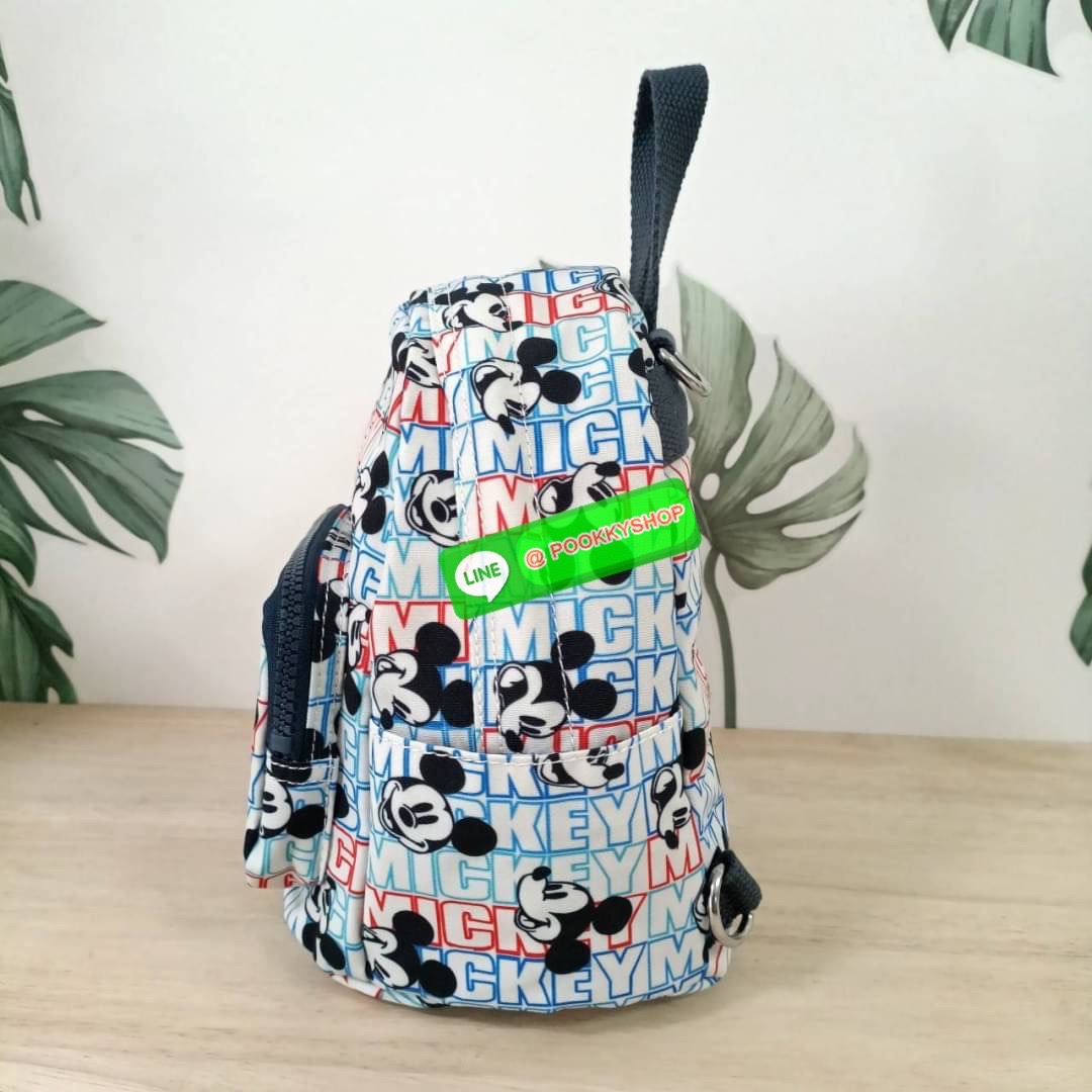 KIPLING Basic Mini Backpack กระเป๋าเป้ใบเล็กกระทัดรัด ขนาดมินิ วัสดุ Nylon + ซับใน Polyester มีหูหิ้ว สามารถสะพายข้าง หรือ สะพายหลังได้ -ช่องซิปหน้า -ด้านข้างมีช่องของเล็กน้อย หรือ ใส่ขวดน้ำใบเล็กทั้ง 2 ด้าน -ซิปหลัก โล่งกว้าง มีสายคล้องพวงกุญแจ พร้อมช่อง