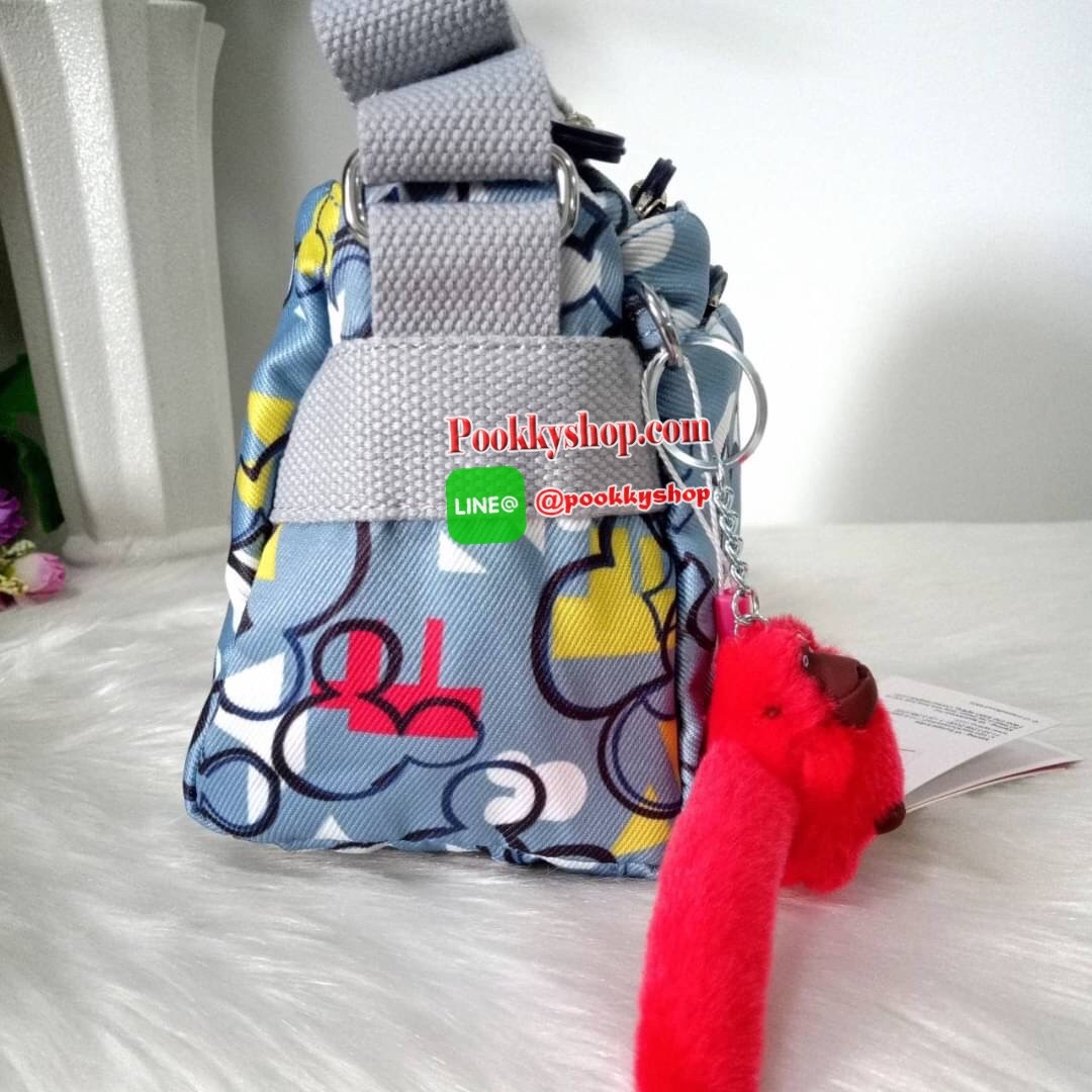 KIPLING Mini Crossbodybag กระเป๋าสะพายข้างขนาดกะทัดรัด ผลิตจากวัสดุ Nylon+ Polyester100% มีช่องใช้งานแยกย่อยมากถึง 4 ช่อง -ด้านหน้ามีช่องซิป 2 ช่อง -ช่องหลักโล่ง กว้าง จุของใช้ได้เยอะ -ด้านหลังมีช่องซิปอีก 1 ช่อง มาพร้อมพวงกุญเเจลิง สายสะพายยาวสามารถปรับไ