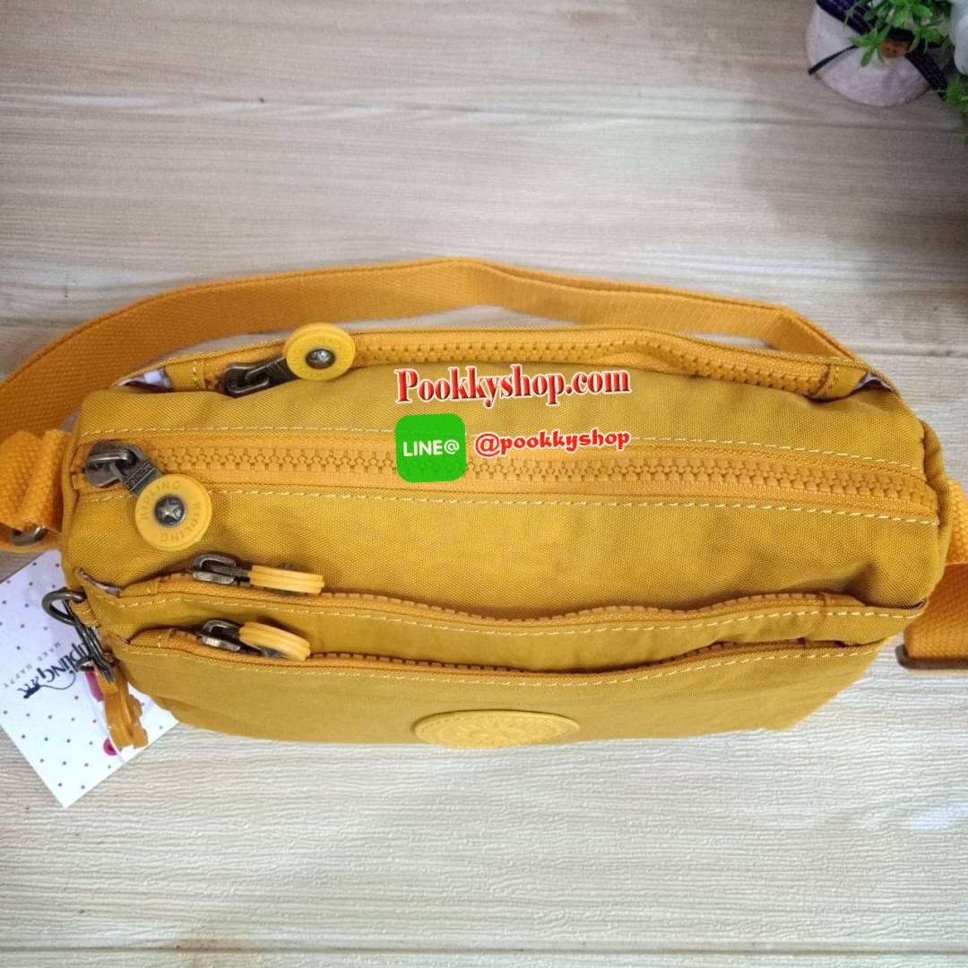 KIPLING Mini Crossbodybag กระเป๋าสะพายข้างขนาดกะทัดรัด ผลิตจากวัสดุ Nylon+ Polyester100% มีช่องใช้งานแยกย่อยมากถึง 4 ช่อง -ด้านหน้ามีช่องซิป 2 ช่อง -ช่องหลักโล่ง กว้าง จุของใช้ได้เยอะ -ด้านหลังมีช่องซิปอีก 1 ช่อง มาพร้อมพวงกุญเเจลิง สายสะพายยาวสามารถปรับไ