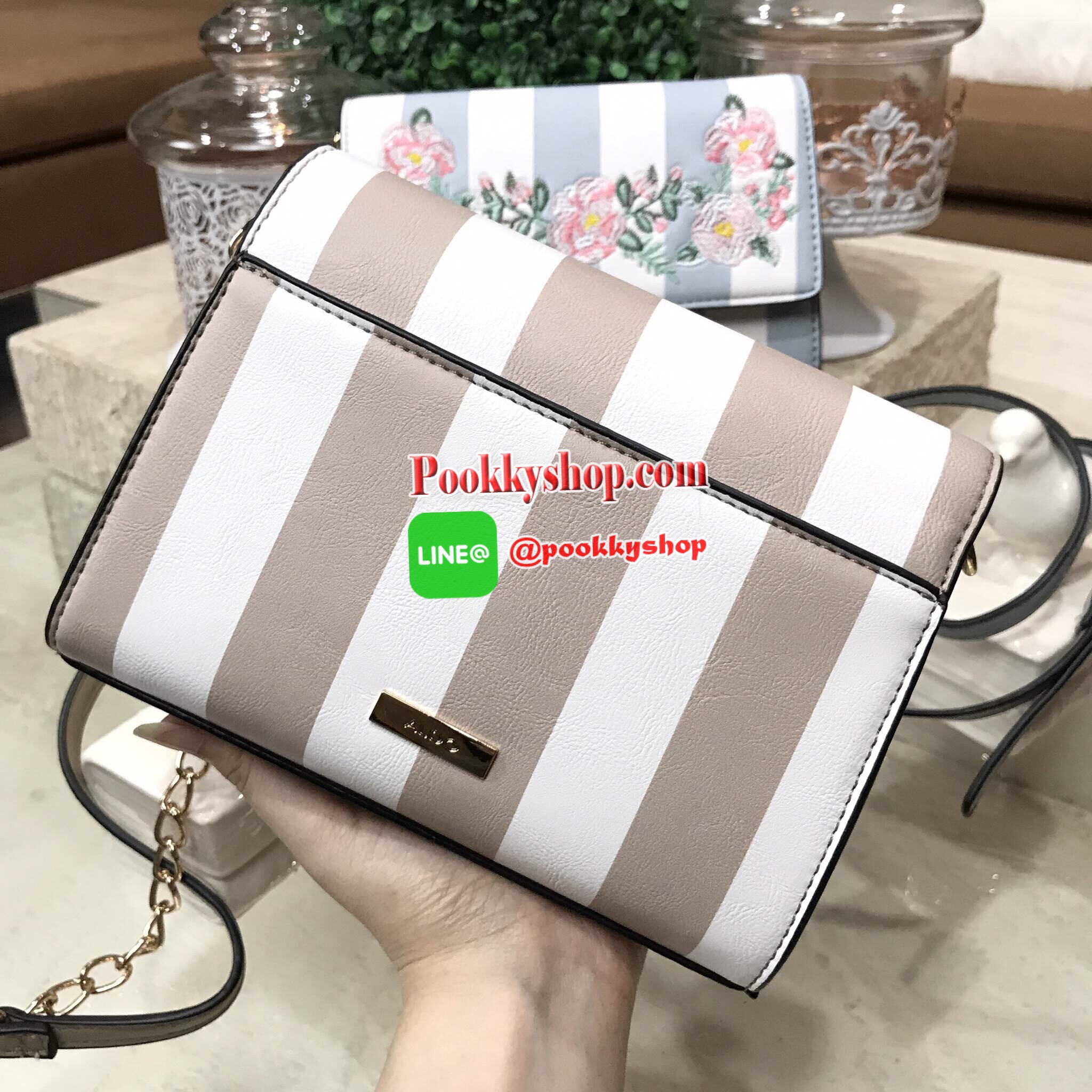 Don't Miss! NEW ARRIVAL! ALDO flower Crossbody Bag กระเป๋าถือ/สะพายรุ่นใหม่ล่าสุด ALDO แบรนด์ดังจากแคนนาดาดีไซน์สุดชิคปักลายดอกไม้สไตล์วินเทจหนังลายทางสพาสเทลอยู่ทรงกันน้ำ เปิดปิดด้วยกระดุมแม่เหล็ก ภายในมีโลโก้ ช่องซิป ช่องใส่มือถือ ใส่iphone7+ได้ น้