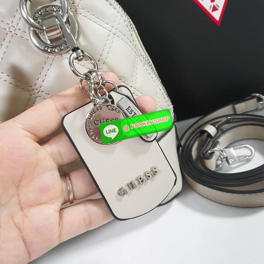 NEW ARRIVALS!! ✨ กระเป๋าถือทรงหรู GUESS CESSILY SMALL DOME SATCHEL HANDBAG วัสดุหนังสังเคราะห์นิ่มมืออะไหล่เงินทั้งใบ มีพวงกุญแจกิมมิคแบรนด์ประดับด้านหน้า เปิดปิดด้านซิปยาว ด้านในใส่กระเป๋าสตางค์ใบกลาง มือถือ ได้สะดวก พร้อมช่องซิป+ช่องใส่ของแยกให้