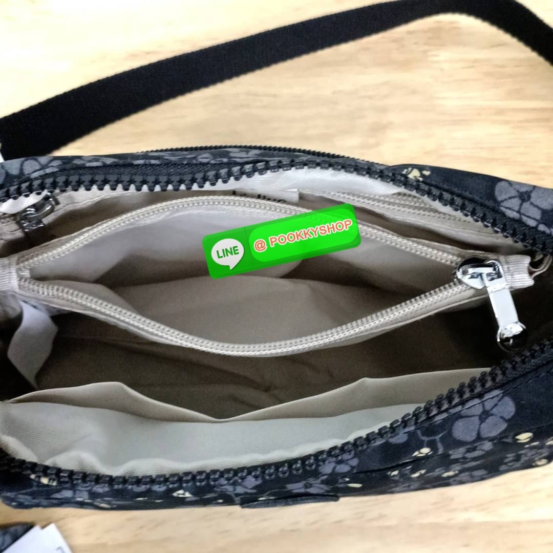 KIPLING Monkey program K16217 Seoul up sling bag รุ่น 3 ซิป สะพายข้าง ขนาดเล็กทรงสี่เหลี่ยมผืนผ้า วัสดุ Nylon 100% หลสกหลายฟังก์ชั่นใช้งาน ครบครันในใบเดียว