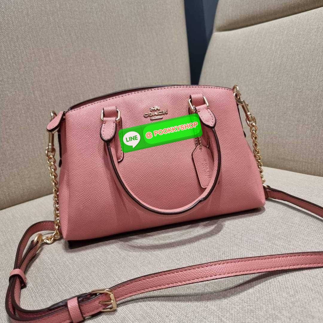 COACH F29434 MINI SAGE CARRYALL IN SIGNATURE CANVAS รุ่นยอดฮิต!! ที่สุดของกระเป๋าสะพายขายดี ต้องทรงถังมินิรุ่นนี้ วัสดุหนังแคนวาสเคลือบลาย สวย คลาสสิค มาพร้อมสายสะพายข้างและหูหิ้วในตัว ถอดออกถือคล้องแขนเก๋ๆ หรูๆยังได้ ภายในเป็นช่องโล่ง แบ่งสัดส่วนอย่างดี