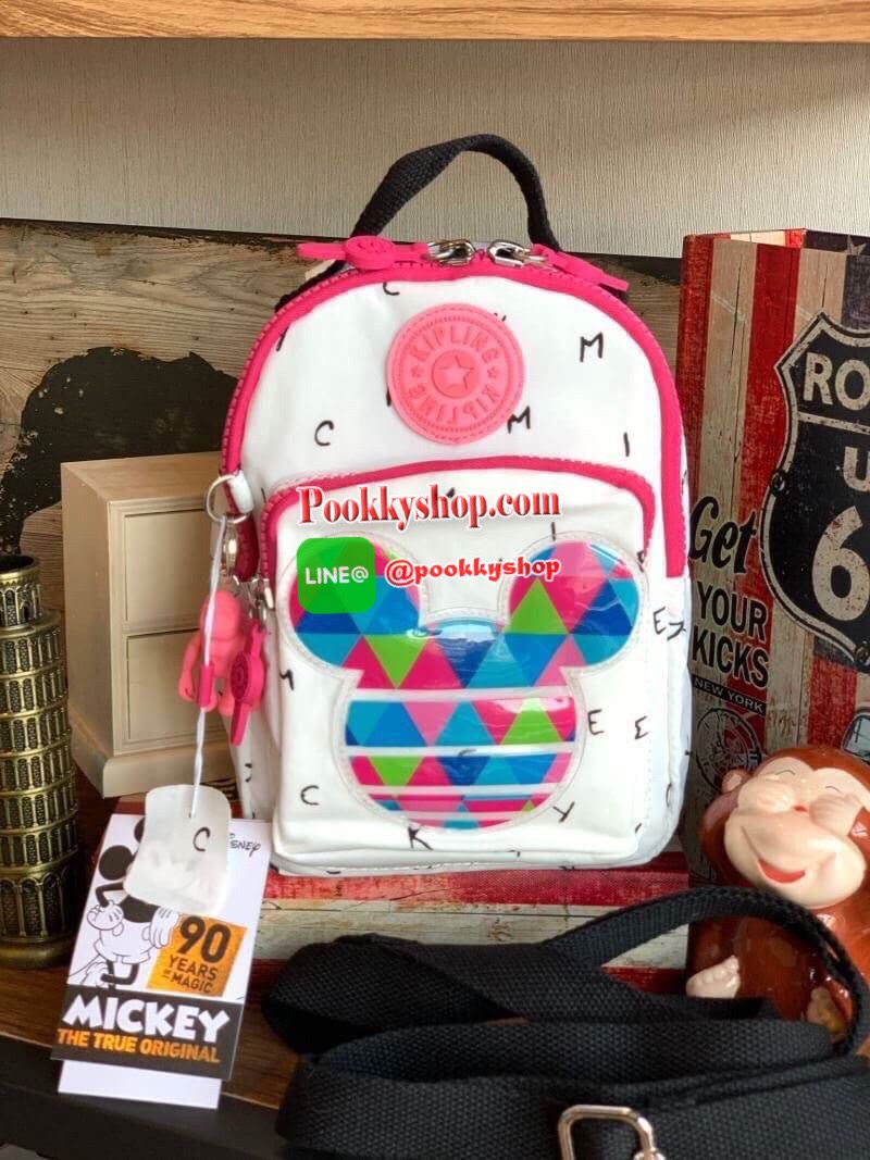Kipling BRight Disney's Minnie Mouse And Mickey Mouse รุ่น Mini Backpack เป็นได้ทั้งทรงcrossbody และmini Backpack พร้อมสายสะพาย2เส้น ปรับฟรีไซส์ได้ สามารถน้ำหนักเบา วัสดุ100% Polyamide ดีเทลน่ารักๆจากบรรดามิคกี้และมินนี่ที่มาวาดลวดลายลงบนกระเป๋าให้ดู