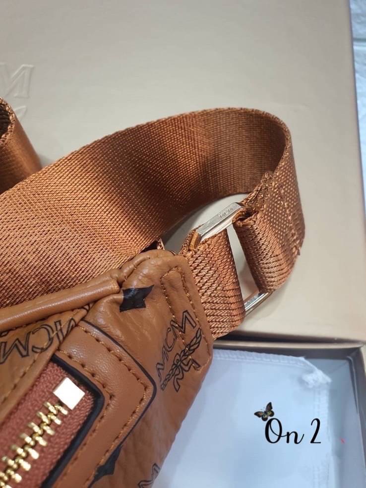 Mcm bag กระเป๋าคาดอกคาดเอวงานแบรนด์ ลาย โมโนแกรม หนังสวยงานดีงานเป๊ะมากค่ะ ผู้หญิงสะพายได้ ผู้ชายสะพายดี ห้ามพลาดน้า