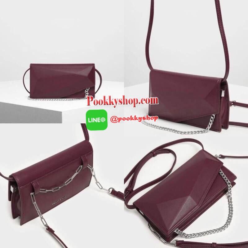 New! Arriva!! CHARLES & KEITH GEOMETRIC CHAIN LINK BELT BAGรุ่นใหม่ชนช็อป! กระเป๋าคลัทช์ใบยาว เล่นดีเทลที่ด้านหน้า เปิดปิดด้วยกระดุมแม่เหล็ก ด้านในมีช่องใส่บัตร 8 ใบ ช่องซิป 1 ช่อง สามารถใส่ iPhone plus ได้สบายค่า รุ่นนี้คล้องสายหนังสะพายแบบครอสบอดี้ได้ /