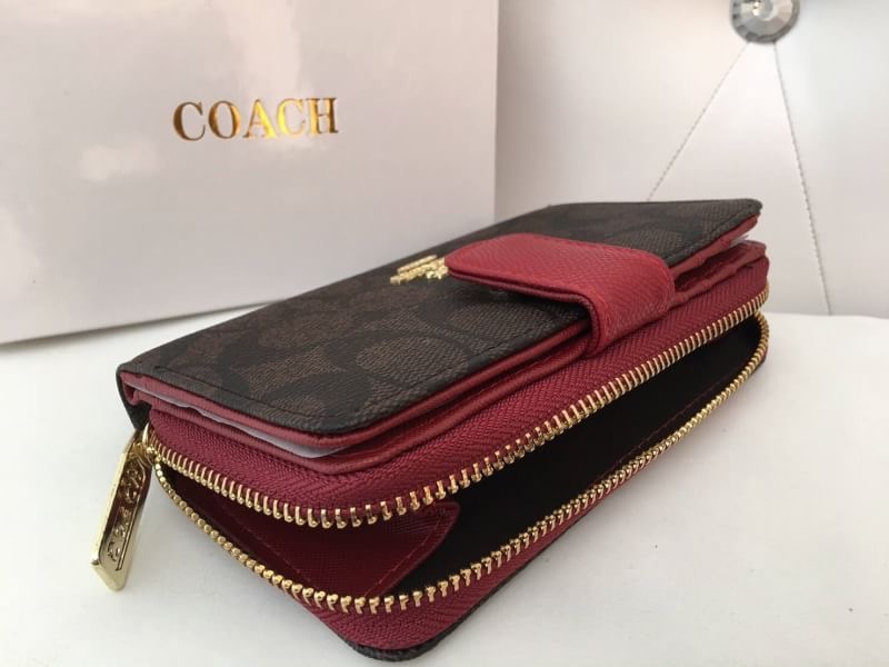 กระเป๋าสตางค์ รุ่นขายดี กระเป๋าสตางค์ Coach สองพับ งานเกรดพรีเมี่ยมปั้มทุกจุด ติดโลโก้ปั้ม Coach ด้านใน 1 ช่องใส่เเบงค์ ใส่บัตร 1 ซิป ภายในมี 2 ช่อง งานสวย เนี๊ยบสุด อุปกรณ์ กล่องเเบรนด์