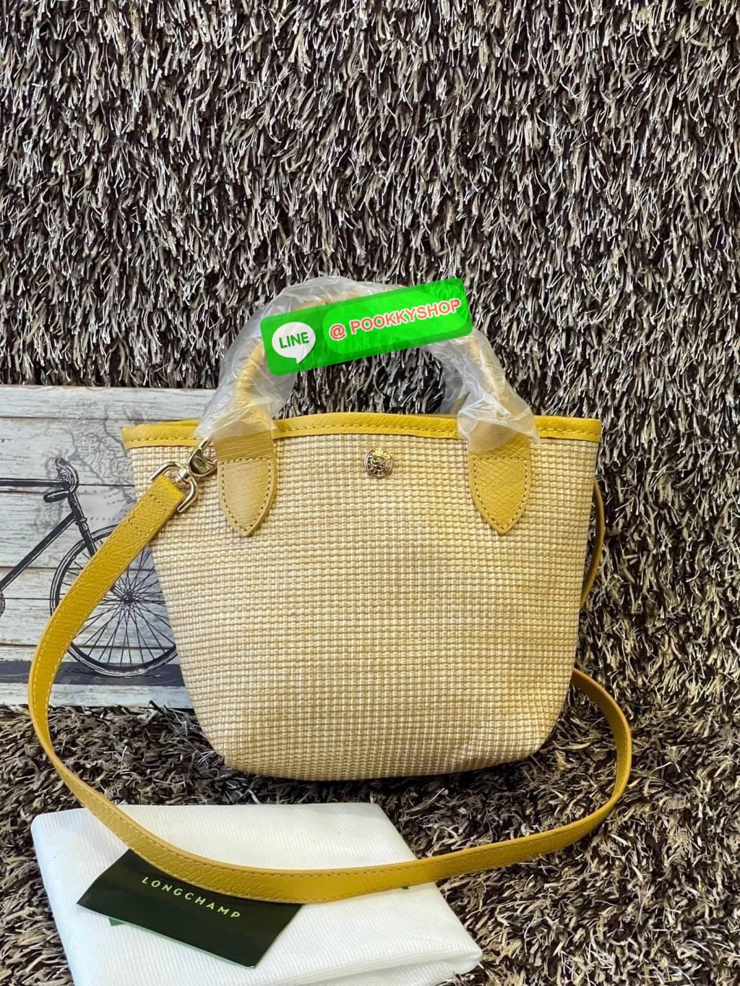 ðLONGCHAMP Le Pliage Paris - St Tropez Handtasche āļĢāļļāđāļāđāļŦāļĄāđāļāļēāļāđāļāļĢāļāļāđ āđāļāđāļāļāļĢāļ°āđāļāđāļēāļāļ·āļāļŦāļĢāļ·āļāļŠāļ°āļāļēāļĒ āļāļēāļāļŠāļēāļ raffia āļāļēāļāļāļĢāļ°āđāļāđāļēāļāļąāļāļāđāļ§āļĒāļŦāļāļąāļāļŠāļĩāļāđāļ§āļĒāļĨāļļāļāļāđāļŠāļļāļāđāļāđāļāļāļāđāļŦāļĨāđāļē Celebrities āļāļąāļāļāļĢāļ°āđāļāđāļēāļāļīāļāļāļīāļāļŠāļļāļāļŪāļīāļāļāļēāļ Longchamp āļāļĒāđāļēāļ Le Pliage Paille (āđāļĨāļ āļāļĨāļīāļĒāļēāļ āđāļāļĨāđ) āļĄāļĩāđāļĨāđ