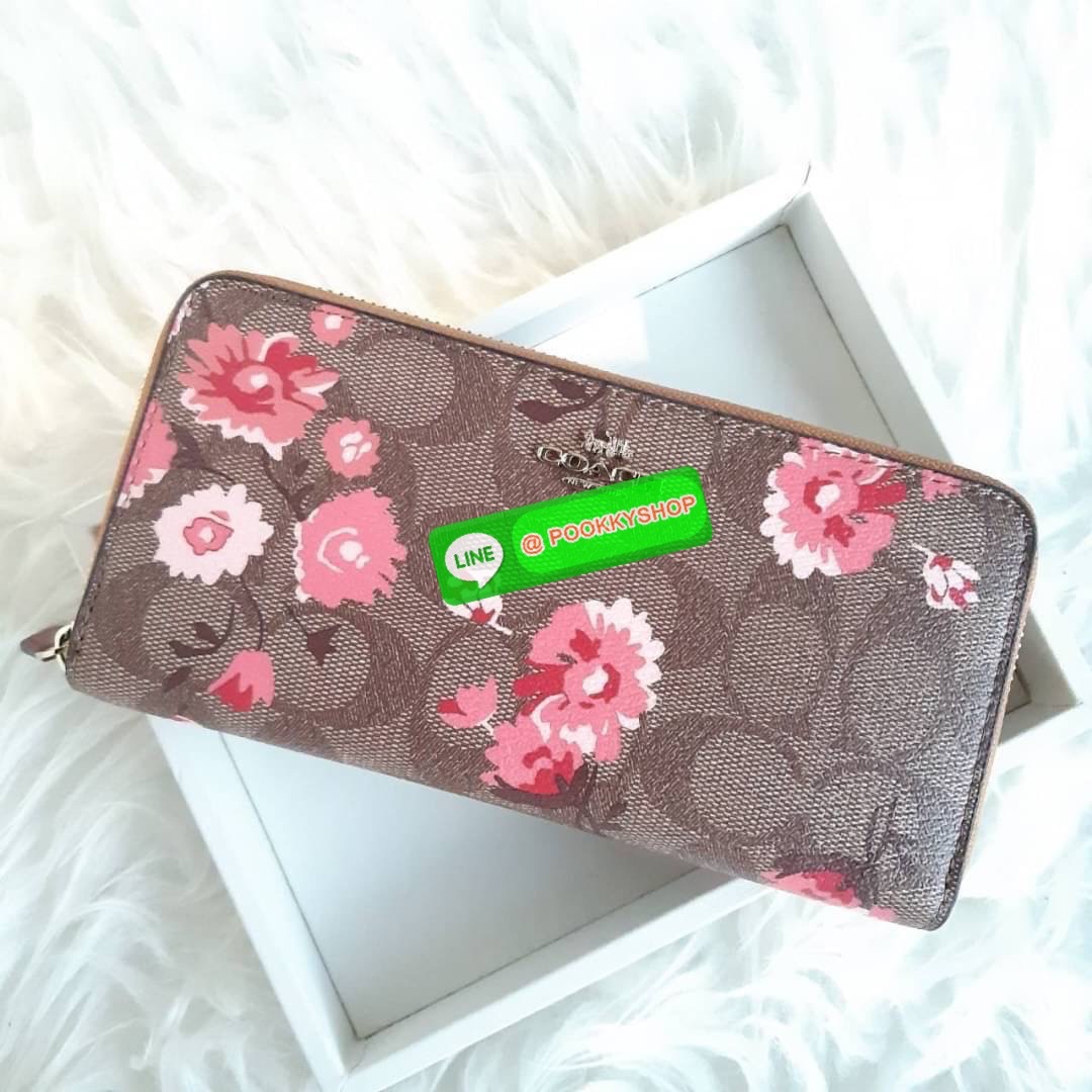 COACH F78018 ACCORDION ZIP WALLET IN SIGNATURE CANVAS WITH PRAIRIE DAISY CLUSTER PRINT ฮอตไม่เลิก!! กระเป๋าสตางค์ใบยาว ลวดลายดอกไม้ ขายดีที่สุด!! วัสดุหนังแคนวาสเคลือบลาย เปิด-ปิดด้วยซิปรอบ รูดใช้งานง่าย ใส่มือถือได้ ใส่บัตร ใส่ธนบัตรได้สบายๆ สวยเกินราคาแ