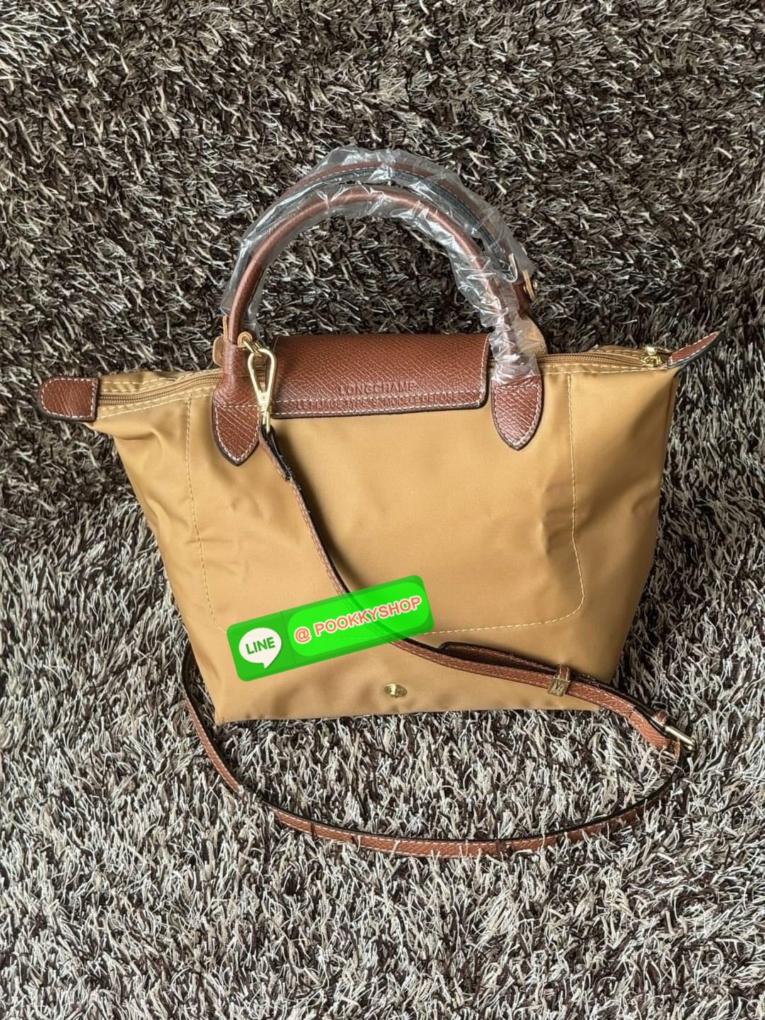 LONGCHAMP LE PLIAGE ORIGINAL S HANDBAG Crossbody Bag กระเป๋าสะพายไหล่ รุ่น Original มีเอกลักษณ์อันโดดเด่นของรุ่นไอคอนนิคของ Longchamp อย่าง Le Pliage (เลอ ปลิยาจ) โดย Longchamp ได้รับแรงบันดาลใจจากศิลปะการพับกระดาษแบบ Origami (โอริกามิ) ในการสรรค์สร้างกระ