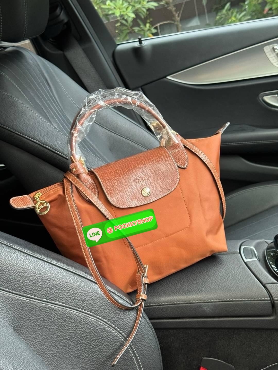 LONGCHAMP LE PLIAGE ORIGINAL S HANDBAG Crossbody Bag กระเป๋าสะพายไหล่ รุ่น Original มีเอกลักษณ์อันโดดเด่นของรุ่นไอคอนนิคของ Longchamp อย่าง Le Pliage (เลอ ปลิยาจ) โดย Longchamp ได้รับแรงบันดาลใจจากศิลปะการพับกระดาษแบบ Origami (โอริกามิ) ในการสรรค์สร้างกระ