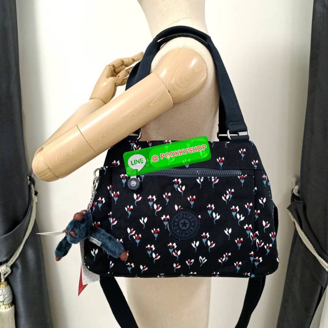 KIPLING ELISE HANDBAG กระเป๋าถือและสะพายไหล่ วัสดุ Nylon +Polyester ขนาดกำลังพอดี จุของได้มาก มีหูจับสองสาย ถือสะดวก น้ำหนักเบา มีช่องซิป ด้านหน้า ช่อง กระเป๋าหลักเปิด-ปิดด้วยซิป มี3 ช่องว่างใส่ของได้จุมากๆ ใส่มือถือได้ กระเป๋าสตางค์ใบยาว และ เครื่องสำอาง
