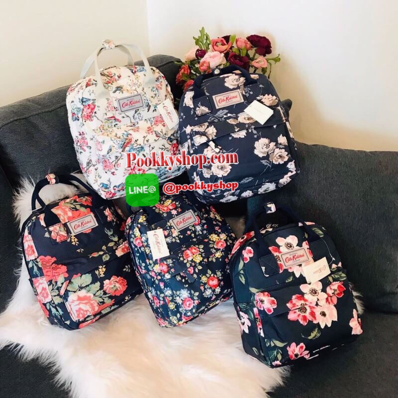 Best Seller !! Cath Kidston Multi Strap Backpack กระเป๋าสะพายเป้รุ่นมินิ แบรนด์ดังสไตล์วินเทจสุดฮิต วัสดุ Canvas เคลือบกันน้ำสามารถเช็ดทำความสะอาดง่าย เปิดปิดกระเป๋าด้วยซิปสะดวกใช้ ด้านหน้าประดับโลโก้แบรนด์สวยโดดเด่น พร้อมช่องซิปด้านหน้ากระเป๋าอีกหนึ่งช่อ