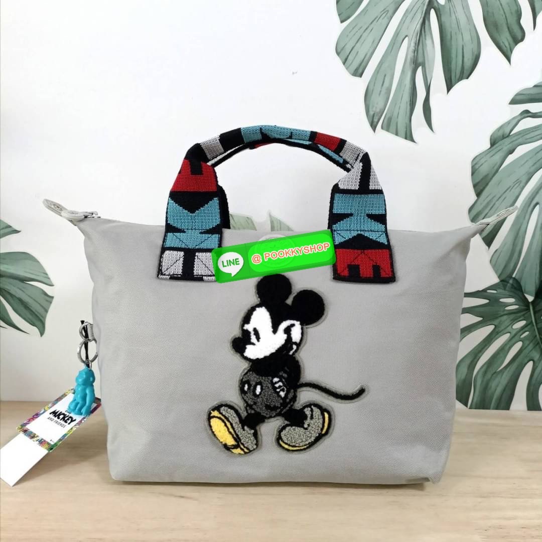 Kipling KALA Mini Disney's Mickey Mouse Handbag กระเป๋าถือหรือสะพาย วัสดุ Polyamide+Polyester รุ่นใหม่ล่าสุด Collection Mickey's ลายน่ารัก ผิวสัมผัสนุ่ม ลื่น พร้อมตัวการ์ตูน Mickey Mouse ไหมพรม ตกแต่งด้านหน้า ช่องหลักโล่งกว้าง พร้อมช่องแยกด้านข้