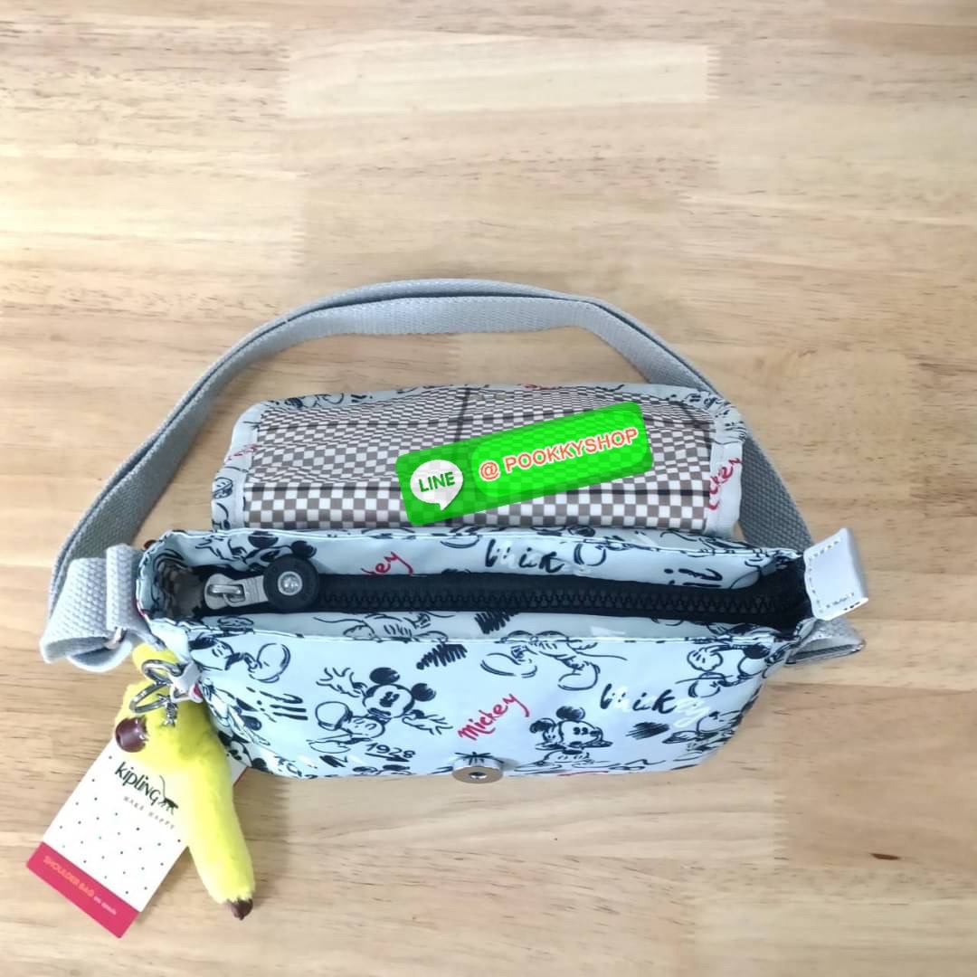 KIPLING SABIAN CROSSBODY MINI BAG กระเป๋าสะพายข้าง วัสดุ Nylon & Polyester 100% ขนาดเล็กกำลังน่ารัก เปิด-ปิดด้วยฝาปิดกระดุมแม่เหล็กและซิปแบรนด์ ด้านในทีแท็กแบรนด์
