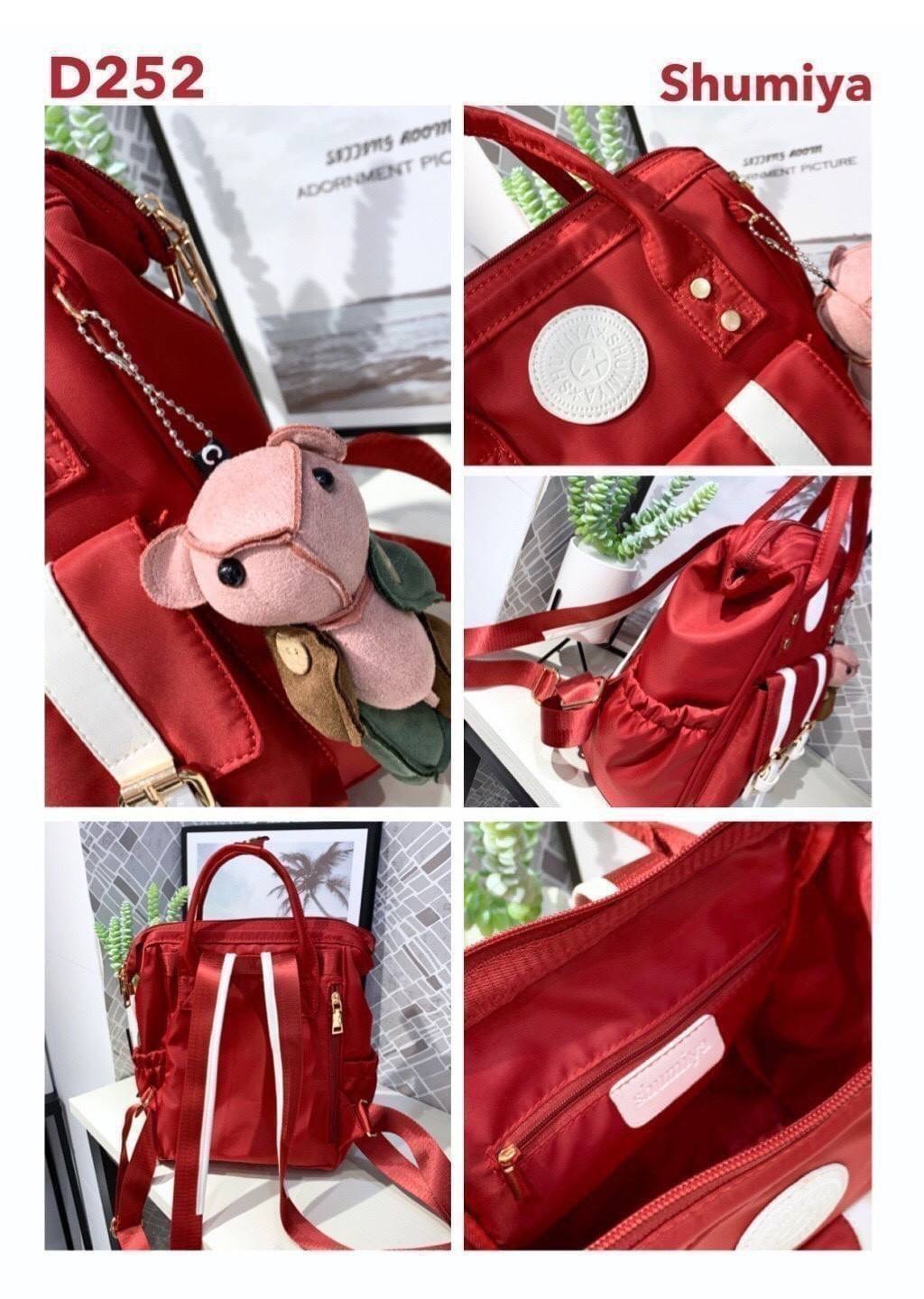 Shumiya Style My Authentic Brand So cute !!! พร้อมส่ง กระเป๋าเป้ Shumiya ทรงน่ารัก ~ ด้านหน้าติดโลโก้แบรนด์และแต่งเข็มขัดเก๋ๆ !!! ใบใหญ่จุใจ ช่องใส่ของเอนกประสงค์เยอะ ด้านหลังมีอีก 1 ช่องซิป สายสะพายทนทาน ตัวกระเป๋าเปิดปิดง่าย แถมฟรีพวงกุญแจหมีน่ารัก สวยค