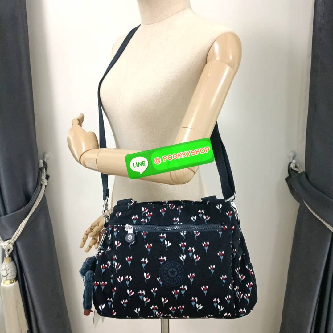 KIPLING ELISE HANDBAG กระเป๋าถือและสะพายไหล่ วัสดุ Nylon +Polyester ขนาดกำลังพอดี จุของได้มาก มีหูจับสองสาย ถือสะดวก น้ำหนักเบา มีช่องซิป ด้านหน้า ช่อง กระเป๋าหลักเปิด-ปิดด้วยซิป มี3 ช่องว่างใส่ของได้จุมากๆ ใส่มือถือได้ กระเป๋าสตางค์ใบยาว และ เครื่องสำอาง