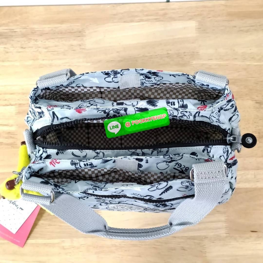 KIPLING ELISE HANDBAG กระเป๋าถือและสะพายไหล่ วัสดุ Nylon +Polyester ขนาดกำลังพอดี จุของได้มาก มีหูจับสองสาย ถือสะดวก น้ำหนักเบา มีช่องซิป ด้านหน้า ช่อง กระเป๋าหลักเปิด-ปิดด้วยซิป มี3 ช่องว่างใส่ของได้จุมากๆ ใส่มือถือได้ กระเป๋าสตางค์ใบยาว และ เครื่องสำอาง