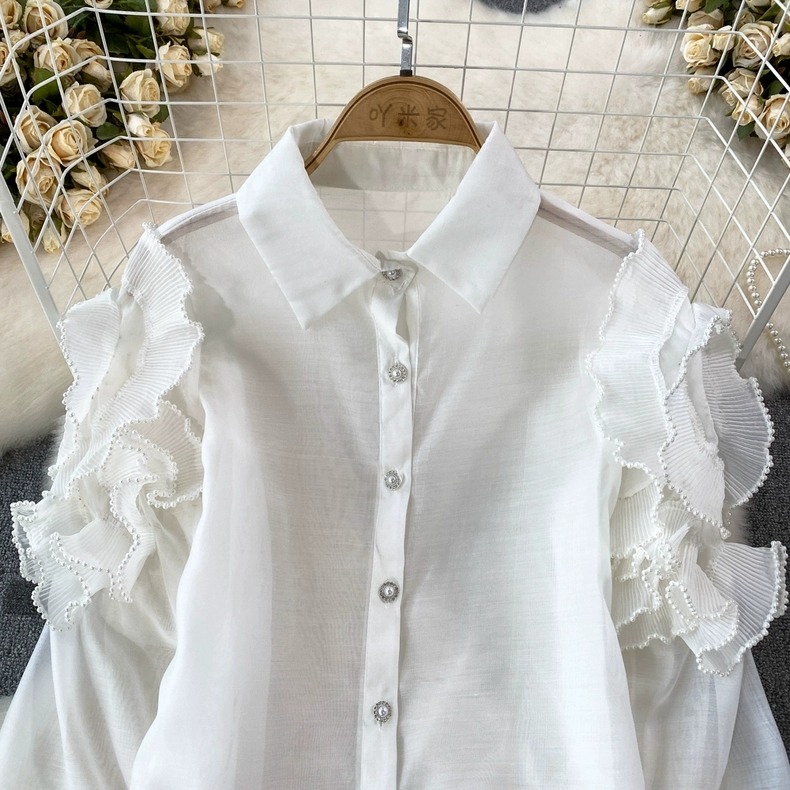 เสื้อแฟชั่น เสื้อเชิ้ตคอปกแขนยาว ดีเทลแต่งผ้าพลีทที่ต้นแขนพร้อมปักลูกปัดมุก