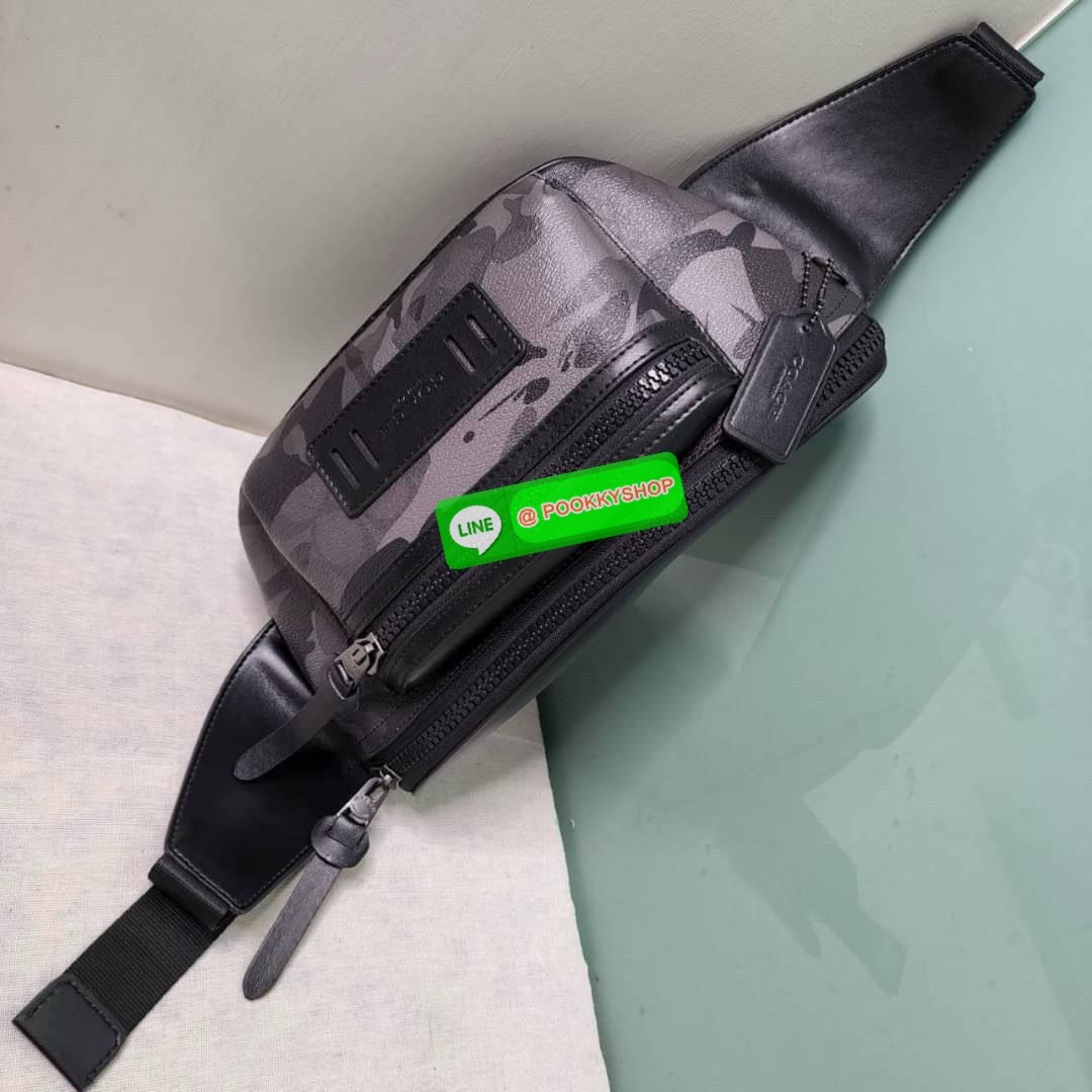 กระเป๋า คาดอก/คาดเอว COACH TERRAIN BELT BAG IN SIGNATURE CANVAS WITH CAMO PRINT (COACH F89034) เป๋าคาดเข็มขัด ผ้าใบเคลือบซิกเนเจอร์และหนังลูกวัวอย่างดี ภายในกระเป๋ามัลติฟังก์ชั่น ปิดด้วยซิป ซับในผ้า กระเป๋าซิปด้านนอก สายปรับได้สำหรับสวมใส่ที่เอว