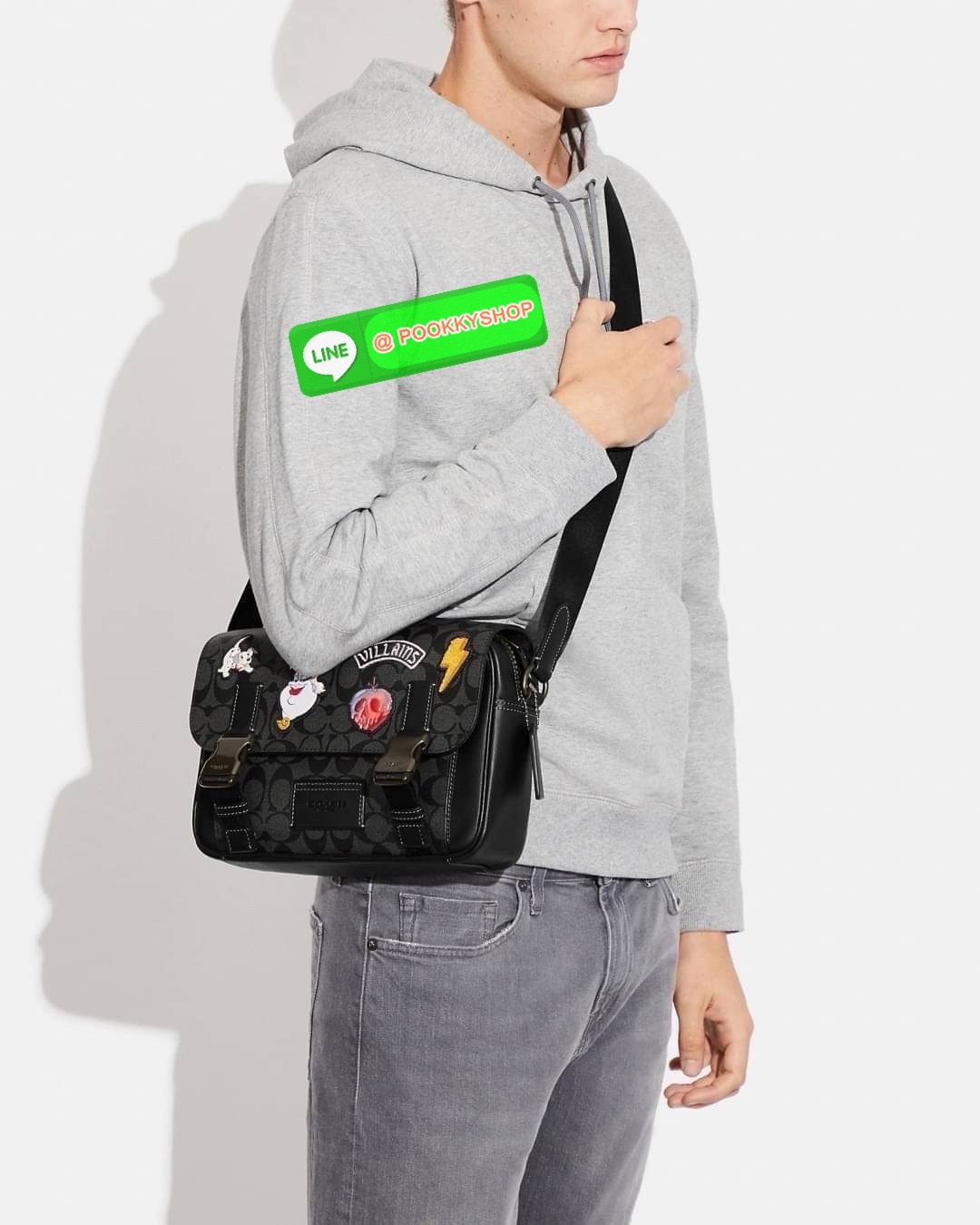 Coach Disney X Coach Track Crossbody In Signature Canvas With Patches Signature coated canvas and smooth calf leather Inside multifunction pockets Zip and speedclip closures, fabric lining Outside slip pocket