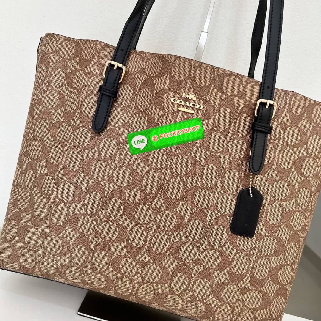 Coach MOLLIE TOTE IN SIGNATURE CANVAS (COACH 1665) กระเป๋าหนังใบเคลือบซิกเนเจอร์และหนังเรียบ ภายในกระเป๋ามัลติฟังก์ชั่น ปิดด้วยซิป ซับในผ้า หูหิ้วพร้อมหูหิ้ว 10 1/4" ช่องเปิดด้านข้าง