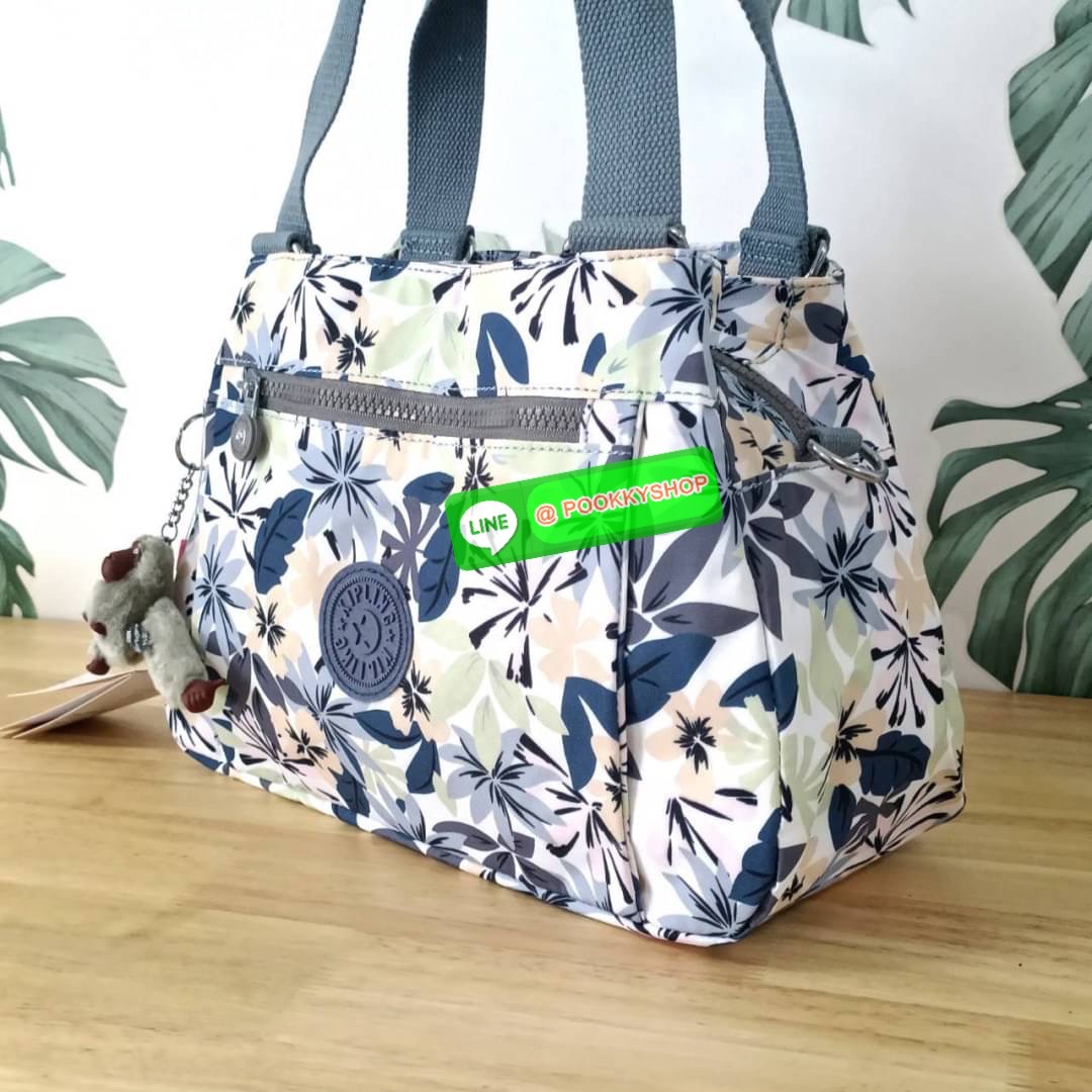 KIPLING ELISE HANDBAG กระเป๋าถือและสะพายไหล่ วัสดุ Nylon +Polyester ขนาดกำลังพอดี จุของได้มาก มีหูจับสองสาย ถือสะดวก น้ำหนักเบา มีช่องซิป ด้านหน้า ช่อง กระเป๋าหลักเปิด-ปิดด้วยซิป มี3 ช่องว่างใส่ของได้จุมากๆ ใส่มือถือได้ กระเป๋าสตางค์ใบยาว และ เครื่องสำอาง