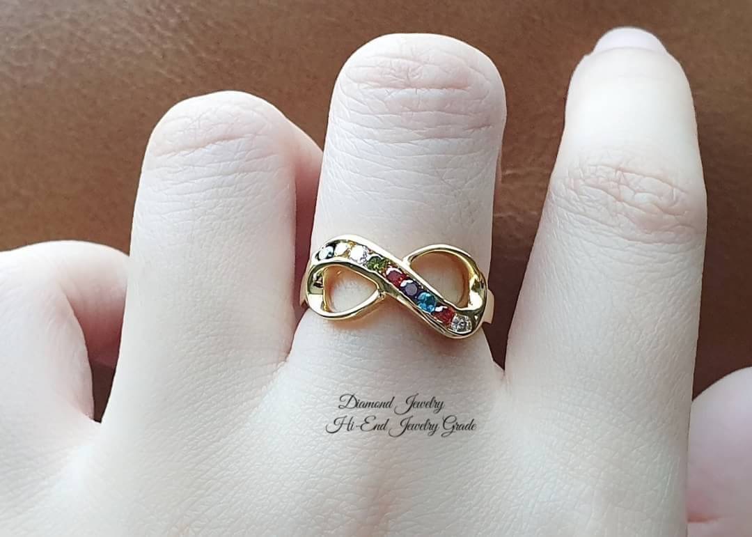 New Arrival !!!!!!! Infinity Ring แหวนอินฟีนิตี้ประดับพลอยนพเก้า เพชรพลอย CZ แท้ สีสวยเพชรขาวใสมากๆๆๆ เล่นไฟดีเว่อร์ๆ ใส่ออกมาขนาดกำลังดี สวย เป็นสิริมงคลแก่ผู้สวมใส่ ตัวเรือนชุบทองคำแท้ 5 ไมครอน สีทอง 24K เหมือนทองแท้ ไม่หลอกตาค่ะ ใส่ออกมาเหมือนของแท้มาก