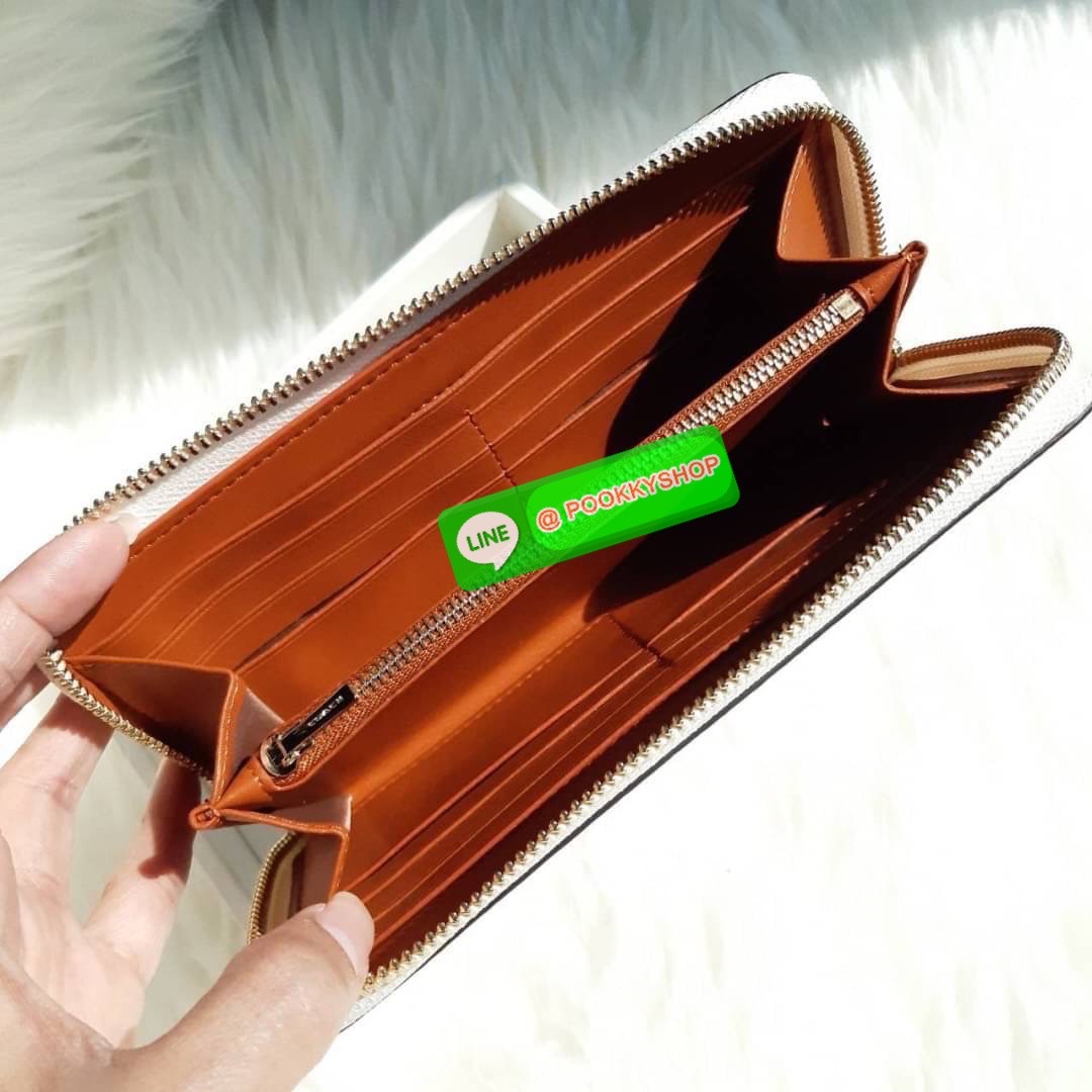 COACH 69832 ACCORDION ZIP WALLET WITH MEADOW PRAIRIE PRINT กระเป๋าสตางค์ใบยาวซิปรอบ ลายดอกไม้น่ารักมากเว่อร์!! ลวดลายตัดกับสีชอล์กได้อย่างลงตัว ดูละมุนน่าใช้ วัสดุหนัง pepble สวยทนทาน ใส่มือถือได้ ใส่ธนบัตรได้ทุกชนิด ใส่บัตรได้เยอะไปอีก!! จุๆแบบนี้ ราคาดี