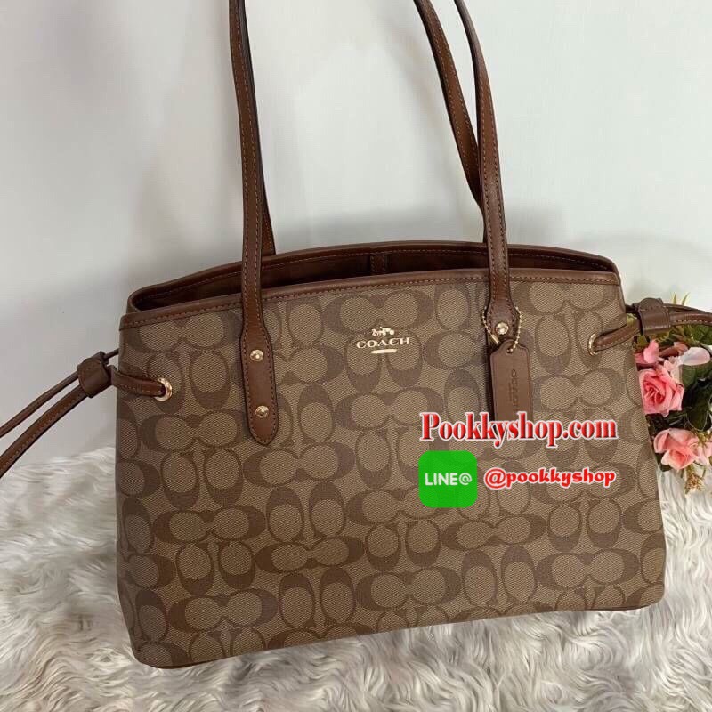 COACH กระเป๋า DRAWSTRING CARRYALL IN SIGNATURE COATED CANVAS F57842