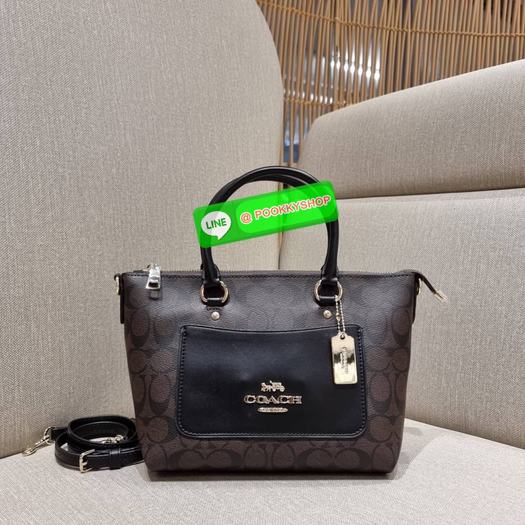 COACH F38089 MINI EMMA SATCHEL IN SIGNATURE CANVAS รุ่นหายาก รุ่นที่สาวๆตามหา จัดมาให้สมกับที่รอคอยกันไปเลยจ้า!! เป็นรุ่นที่ดีไซน์ออกมาให้ใช้งานง่าย สะดวก สวย หรู ดูดี!! กระเป๋าสะพายทรงสวย วัสดุหนังแคนวาสเคลือบลาย มาพร้อมสายสะพายข้างและหูจับในตัว ถอดออกถื