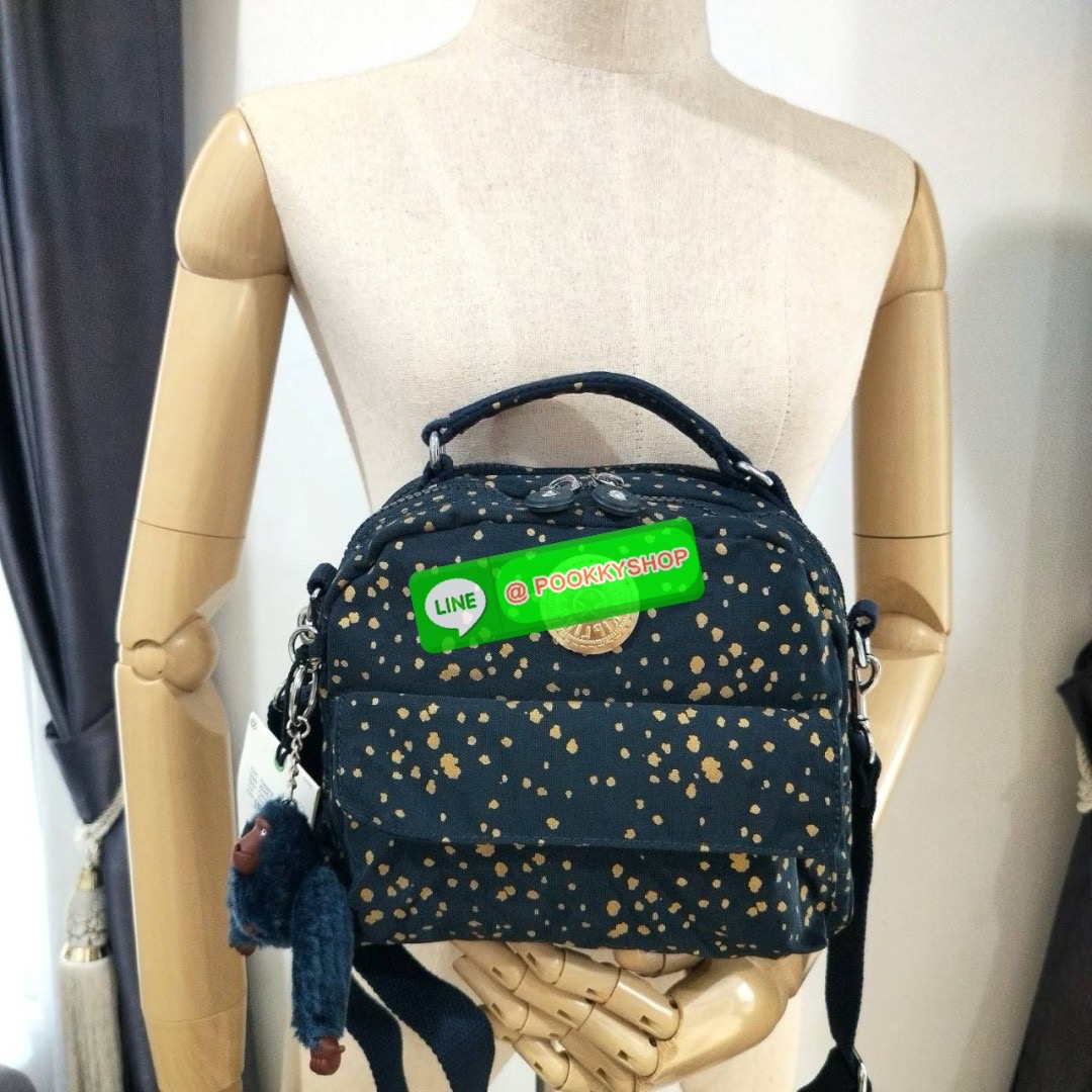 KIPLING Cand 2 ways backpack กระเป๋าถือหรือสะพายข้าง ขนาดกลาง วัสดุ Polyester 100% -ด้านหน้ามี 2 ช่องซิป -ช่องหลักโล่งกว้าง ใส่ของได้เยอะสุดๆ พร้อมช่องซิปและช่องแยกด้านข้างให้แยกของได้เป็นระเบียบมากขึ้น สามารถติใส่กระเป๋าสตางค์ใบยาวได้ มาพร้อมสายคล้องพวงก