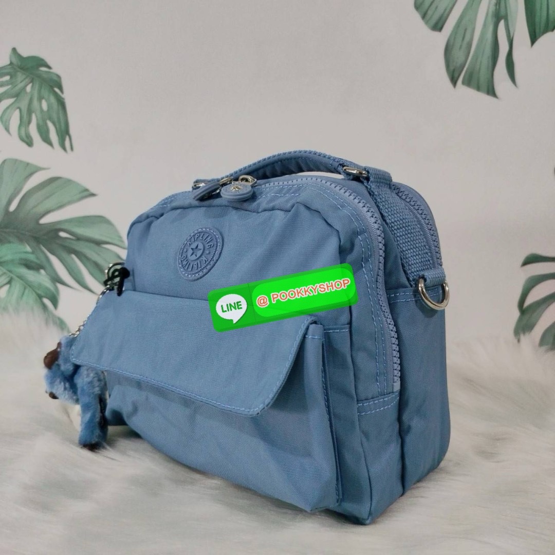 KIPLING Cand 2 ways backpack กระเป๋าถือหรือสะพายข้าง ขนาดกลาง วัสดุ Polyester 100% -ด้านหน้ามี 2 ช่องซิป -ช่องหลักโล่งกว้าง ใส่ของได้เยอะสุดๆ พร้อมช่องซิปและช่องแยกด้านข้างให้แยกของได้เป็นระเบียบมากขึ้น สามารถติใส่กระเป๋าสตางค์ใบยาวได้ มาพร้อมสายคล้องพวงก