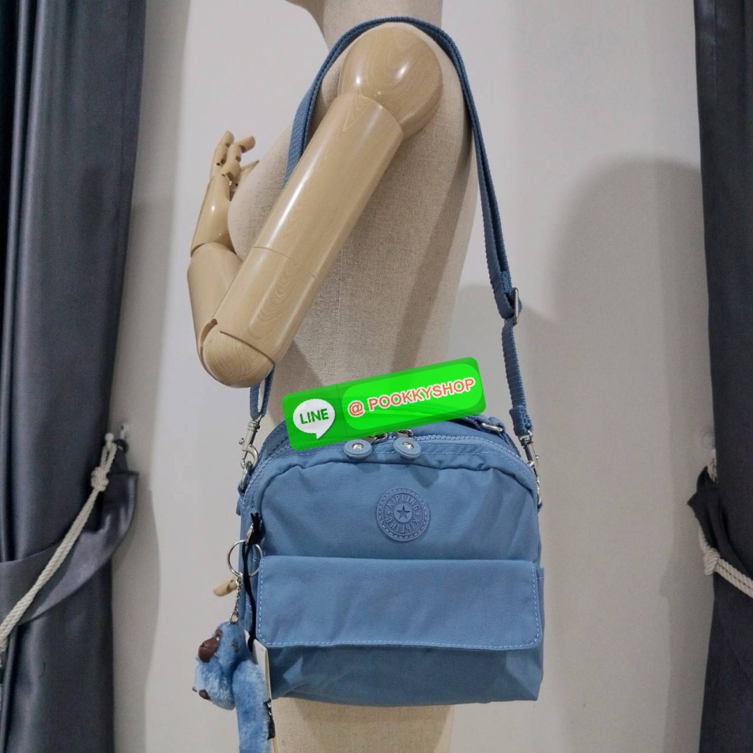 KIPLING Cand 2 ways backpack กระเป๋าถือหรือสะพายข้าง ขนาดกลาง วัสดุ Polyester 100% -ด้านหน้ามี 2 ช่องซิป -ช่องหลักโล่งกว้าง ใส่ของได้เยอะสุดๆ พร้อมช่องซิปและช่องแยกด้านข้างให้แยกของได้เป็นระเบียบมากขึ้น สามารถติใส่กระเป๋าสตางค์ใบยาวได้ มาพร้อมสายคล้องพวงก