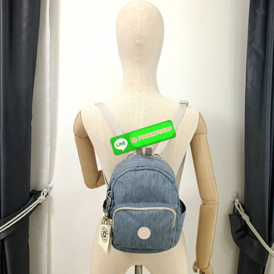 KIPLING Basic Mini Backpack กระเป๋าเป้ใบเล็กกระทัดรัด ขนาดมินิ วัสดุ Nylon + ซับใน Polyester มีหูหิ้ว สามารถสะพายข้าง หรือ สะพายหลังได้ -ช่องซิปหน้า -ด้านข้างมีช่องของเล็กน้อย หรือ ใส่ขวดน้ำใบเล็กทั้ง 2 ด้าน -ซิปหลัก โล่งกว้าง มีสายคล้องพวงกุญแจ พร้อมช่อง