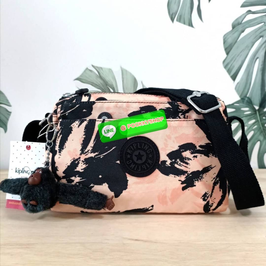 KIPLING Mini Crossbodybag กระเป๋าสะพายข้างขนาดกะทัดรัด ผลิตจากวัสดุ Nylon + ซับใน Polyester100% มีช่องใช้งานแยกย่อยมากถึง 4 ช่อง -ด้านหน้ามีช่องซิป 2 ช่อง -ช่องหลักโล่ง กว้าง จุของใช้ได้เยอะ -ด้านหลังมีช่องซิปอีก 1 ช่อง มาพร้อมพวงกุญเเจลิง สายสะพายยาวสมาร