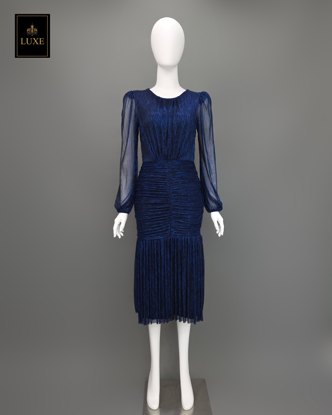 เดรสแฟชั่น เดรสเสื้อคอกลมแขนยาว กระโปรงทรงเข้ารูปจับเดรปตรงกลาง ต่อชายระบาย