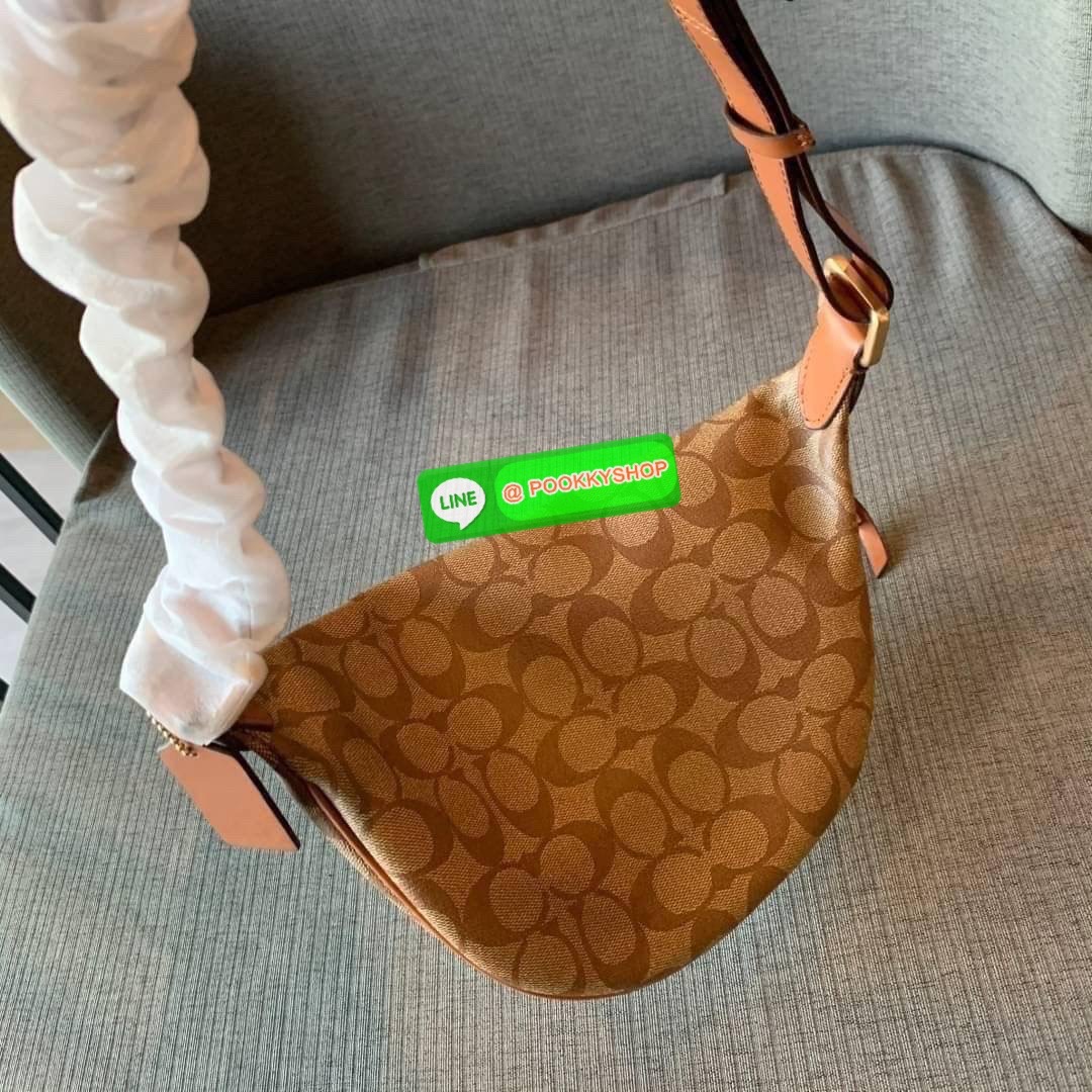 COACH F48740 BELT BAG IN SIGNATURE CANVAS กระเป๋าคาดอกทรง Unisex ทรงโดมรุ่นยอดฮิตไม่มีตกเทรน สวยเท่ทุกสี วัสดุหนังแคนวาสเคลือบคุณภาพดีตัดหนังแท้ ทนทาน ใช้งานง่าย ภายในเป็นช่องโล่ง ใส่ของได้เยอะ หยิบจับได้สะดวก ใช้ได้ทั้งชายและหญิง ใบจริงสวยไม่ผิดหวังคะ