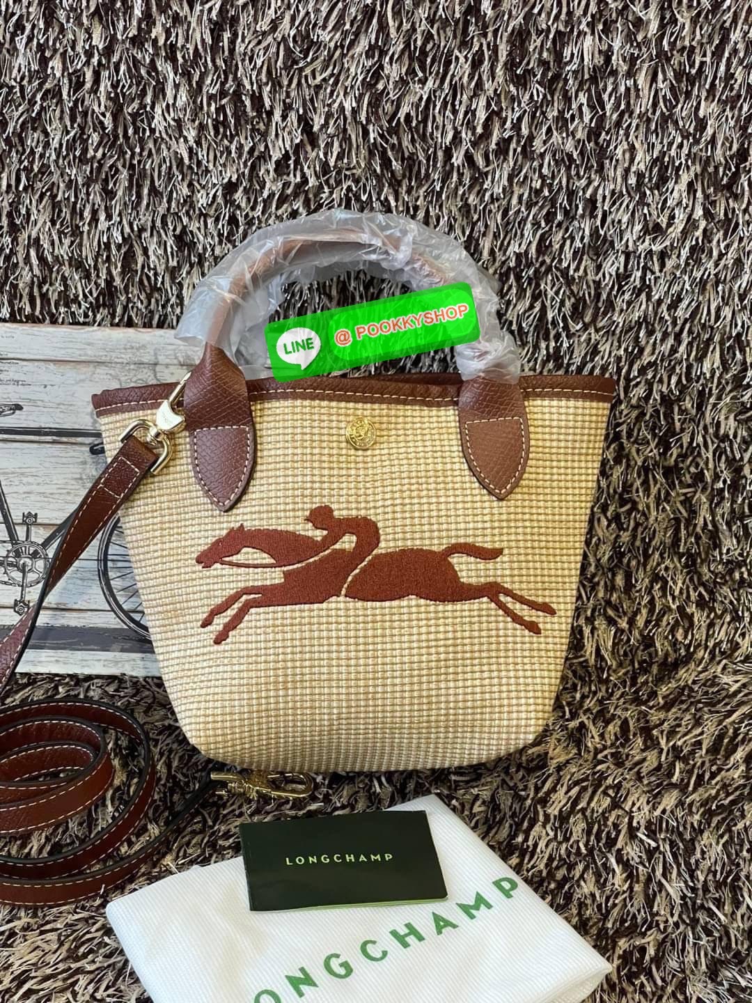 ðLONGCHAMP Le Pliage Paris - St Tropez Handtasche āļĢāļļāđāļāđāļŦāļĄāđāļāļēāļāđāļāļĢāļāļāđ āđāļāđāļāļāļĢāļ°āđāļāđāļēāļāļ·āļāļŦāļĢāļ·āļāļŠāļ°āļāļēāļĒ āļāļēāļāļŠāļēāļ raffia āļāļēāļāļāļĢāļ°āđāļāđāļēāļāļąāļāļāđāļ§āļĒāļŦāļāļąāļāļŠāļĩāļāđāļ§āļĒāļĨāļļāļāļāđāļŠāļļāļāđāļāđāļāļāļāđāļŦāļĨāđāļē Celebrities āļāļąāļāļāļĢāļ°āđāļāđāļēāļāļīāļāļāļīāļāļŠāļļāļāļŪāļīāļāļāļēāļ Longchamp āļāļĒāđāļēāļ Le Pliage Paille (āđāļĨāļ āļāļĨāļīāļĒāļēāļ āđāļāļĨāđ) āļĄāļĩāđāļĨāđ