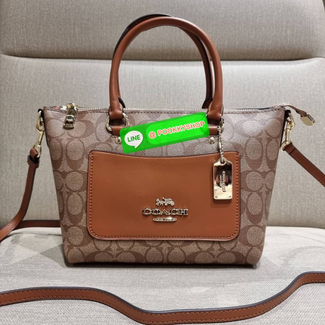 COACH F38089 MINI EMMA SATCHEL IN SIGNATURE CANVAS รุ่นหายาก รุ่นที่สาวๆตามหา จัดมาให้สมกับที่รอคอยกันไปเลยจ้า!! เป็นรุ่นที่ดีไซน์ออกมาให้ใช้งานง่าย สะดวก สวย หรู ดูดี!! กระเป๋าสะพายทรงสวย วัสดุหนังแคนวาสเคลือบลาย มาพร้อมสายสะพายข้างและหูจับในตัว ถอดออกถื