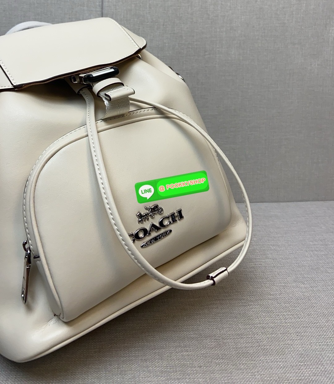 COACH PACE BACKPACK COACH CR100 | Refined calf leather | Inside zip and multifunction pockets | Drawstring and speedclip closures, fabric lining | Handle with 3" drop | Outside zip pocket | Outside zip access to interior |