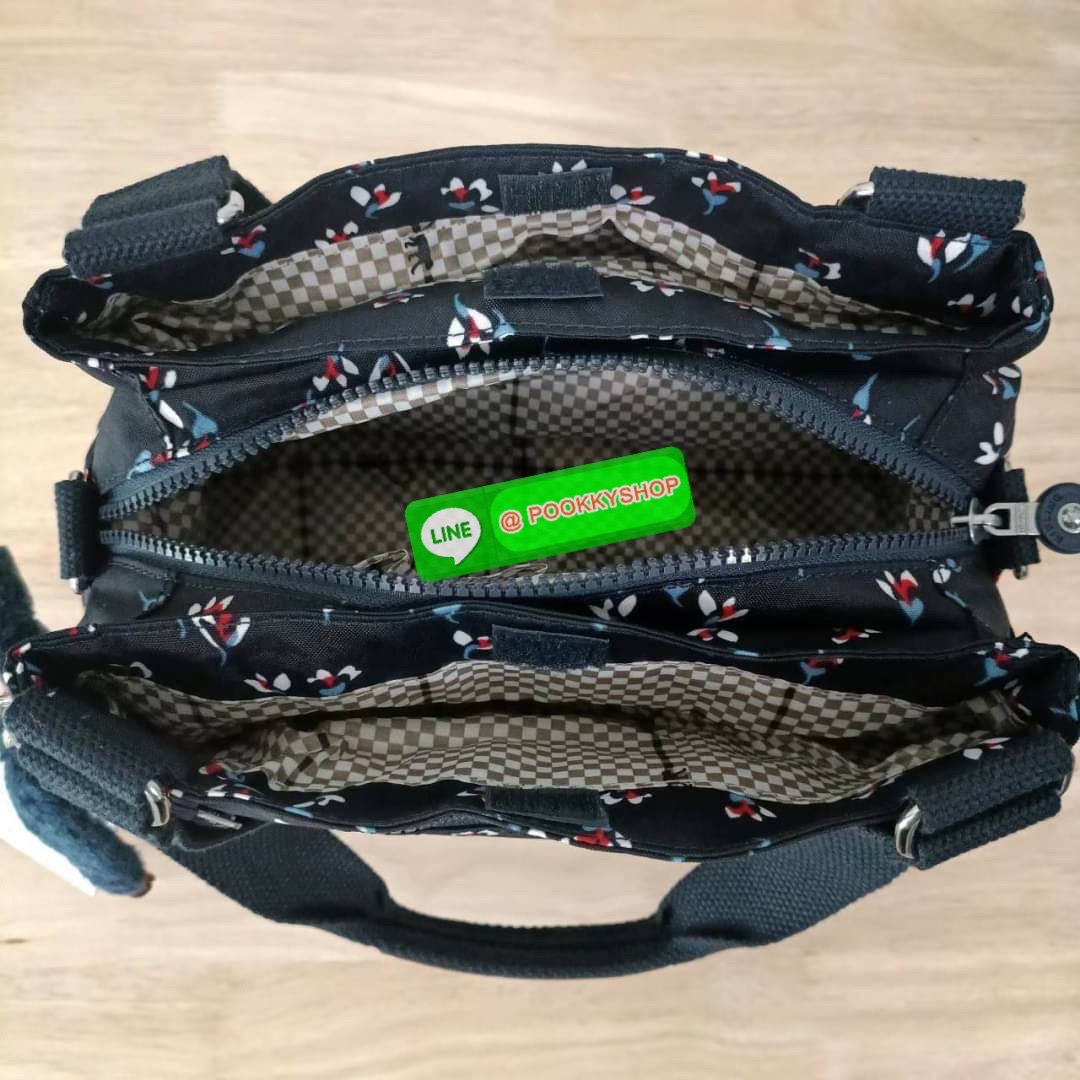 KIPLING ELISE HANDBAG กระเป๋าถือและสะพายไหล่ วัสดุ Nylon +Polyester ขนาดกำลังพอดี จุของได้มาก มีหูจับสองสาย ถือสะดวก น้ำหนักเบา มีช่องซิป ด้านหน้า ช่อง กระเป๋าหลักเปิด-ปิดด้วยซิป มี3 ช่องว่างใส่ของได้จุมากๆ ใส่มือถือได้ กระเป๋าสตางค์ใบยาว และ เครื่องสำอาง