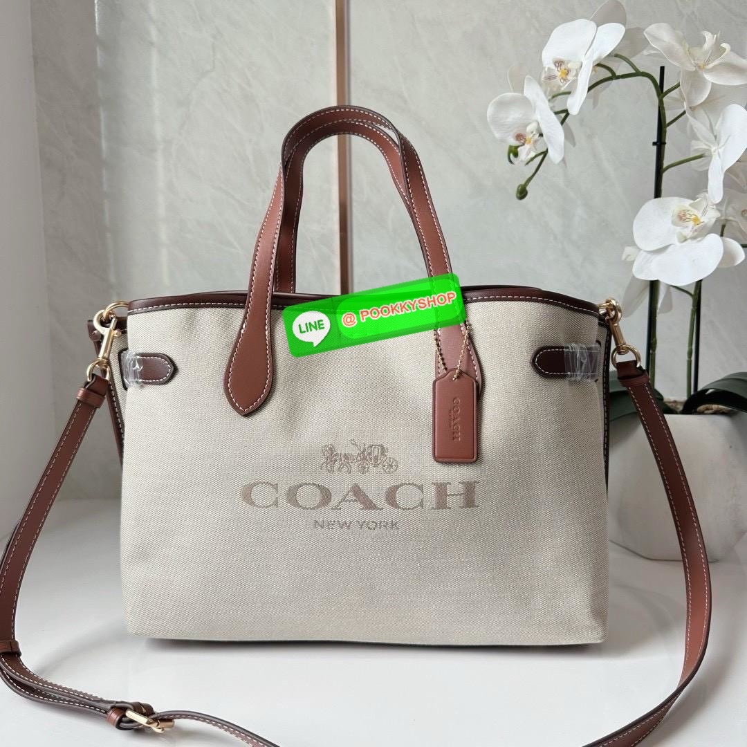 COACH HANNA CARRYALL WITH COACH CH189 IMNAM 🔖กระเป๋าสะพายไหล่/ถือ รูปทรงสวยหรู ลุคคุณนายมากแม่ 🔖วัสดุ: ผ้าแคนวาสตัดขอบหนัง 🔖เปิด-ปิดแบบกระดุมแม่เหล็ก ภายในกระเป๋ามัลติฟังก์ชั่น ช่องซิปกลาง บุผ้า 🔖สายสะพายถอดและปรับระดับได้